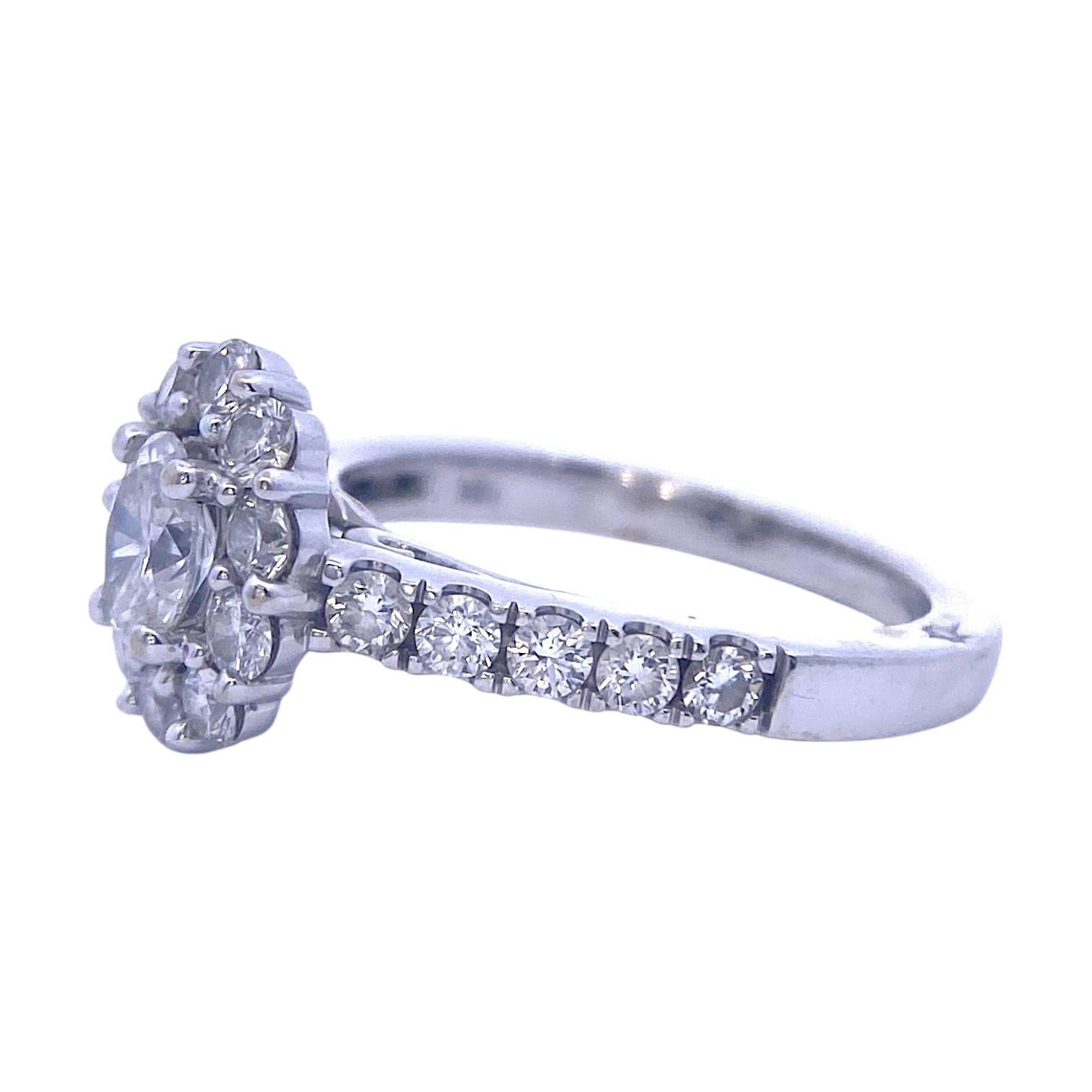 Crafted in 18K white gold, this engagement ring by Marchesa features an elegant oval-cut diamond. The prong-set center stone is surrounded by a halo of brilliant-cut diamonds, enhancing its brilliance.
Primary Diamond: 0.5 ct. Clarity: SI2, Color: