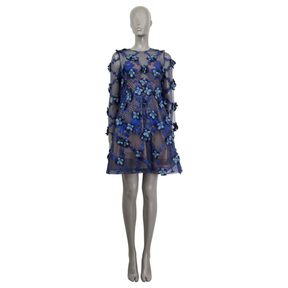 100% authentic Marchesa Notte floral semi sheer dress in electric blue polyester (100%). Features long sleeves and opens with a concealed zipper and a hook at the back. Lined in nude polyester (100%). Brand new, with tags.

Measurements
Tag