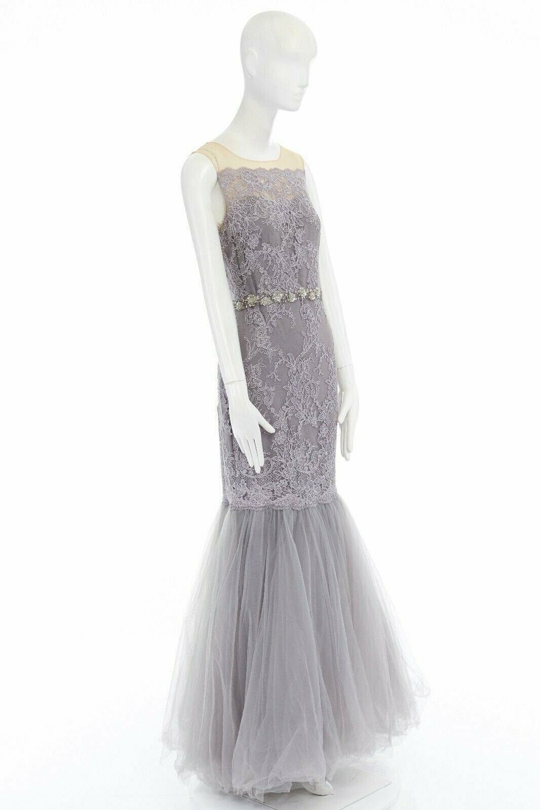 MARCHESA NOTTE grey embroidered mesh embellished belt tulle hem gown US6 
Reference: LACG/A00212 
Brand: Marchesa 
Color: Grey 
Closure: Zip 
Extra Detail: Nude mesh illusion neckline. Embroidered lace. Sequins embellished belt at waist. Tulle