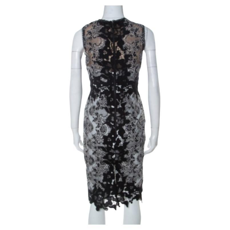 Ein Marchesa Notte-Kleid wie dieses kann Sie problemlos durch alle Jahreszeiten begleiten. Dieses einfarbige Kleid kommt am besten zur Geltung, wenn Sie es mit auffälligen Accessoires stylen. Dieses feminine und stilvolle Kleid aus Mischgewebe ist