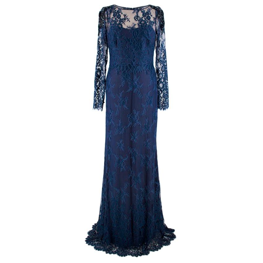 Marchesa Notte Navy long sleeve lace dress 
- Full length floral lace
- Embellished shoulder detail 
- Sweetheart neckline with shear cover 
- Fully lined
- Long sleeve 
- Zip down the back 


Materials

Body
65.1% Nylon
34.9 Polyester
Lining
92%