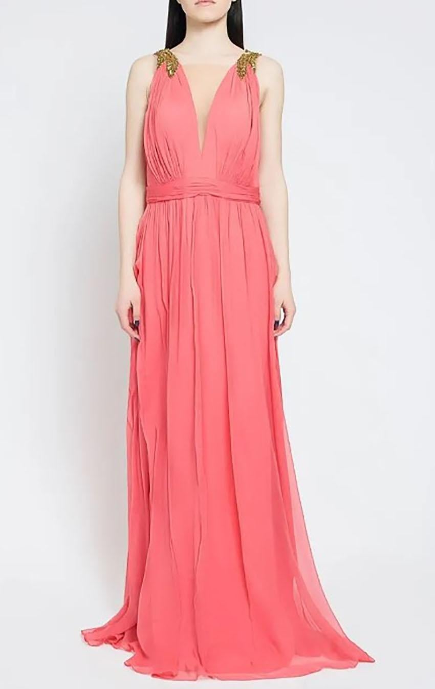 MARCHESA 

Marchesa Notte gown in softly pleated chiffon with beaded appliques on shoulder.
Plunging V neckline
Deep V'd back
Sleeveless
Ruched band at waist
Hem pools floor
Back zip

Content: Silk, polyester/spandex lining.


Brand new, with