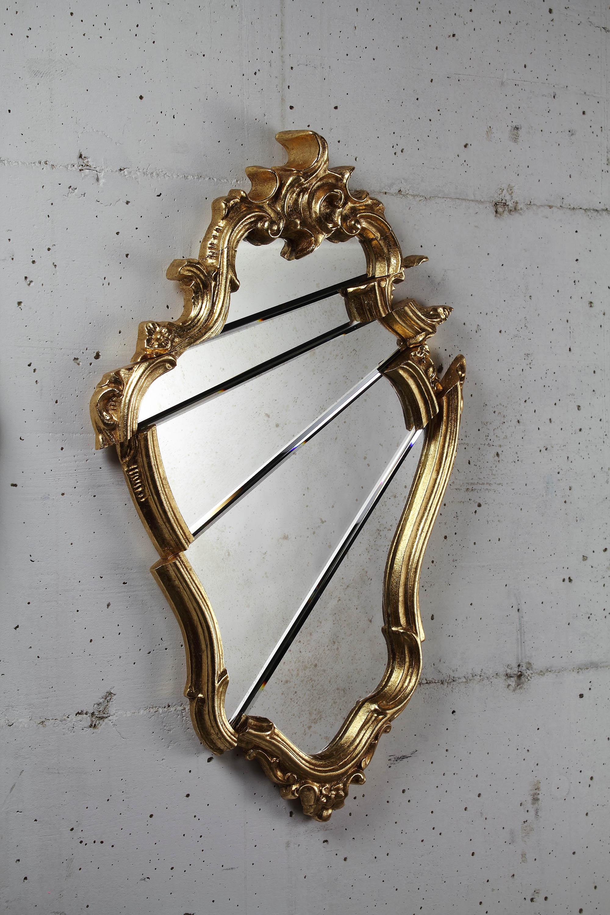Marchese Wall Mirror with Gold-Plated Wooden Frame by Barberini & Gunnell
Limited Edition of 15 + 2 AP + 1 p.
Dimensions: W 45 x H 75 cm. 
Materials: Mirror, gold-plated wood, and MDF.

Limited Edition, signed and numbered by the artists, comes with