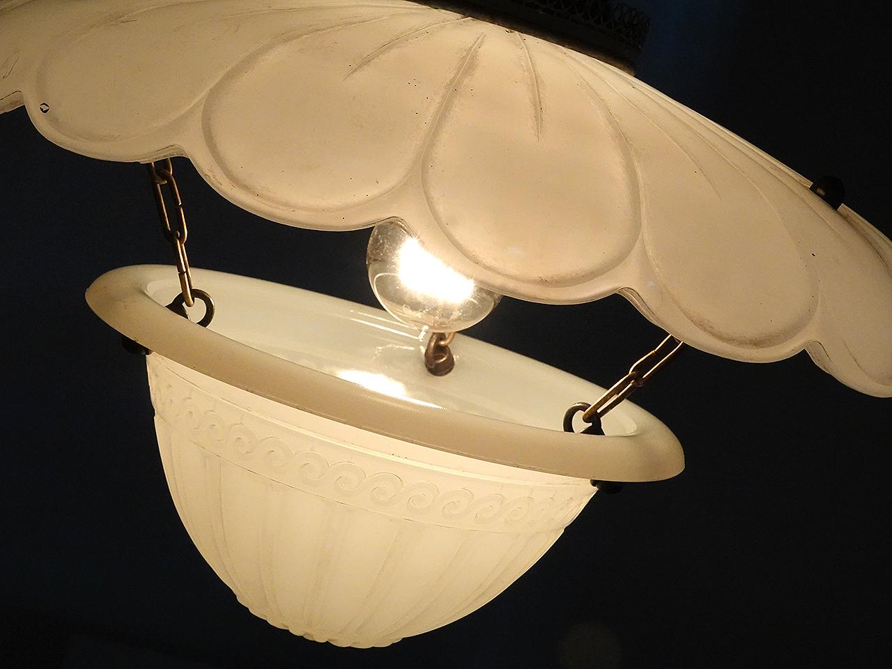 This is one of the more interesting Brasco style pendants we have ever offered. It's the type of lamp sought after by those restoring an old New York brownstone. These were often found just inside the front door or on a stair landing. They are very