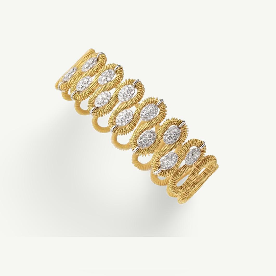 Bracciale con diamanti in oro 18 carati bicolore di Marchisio, gioiellieri italiani dal 1859

Questo bracciale in oro 18 carati bicolore è stato realizzato a mano nei laboratori di Marchisio, stimato gioielliere italiano fondato a Torino nel 1859.