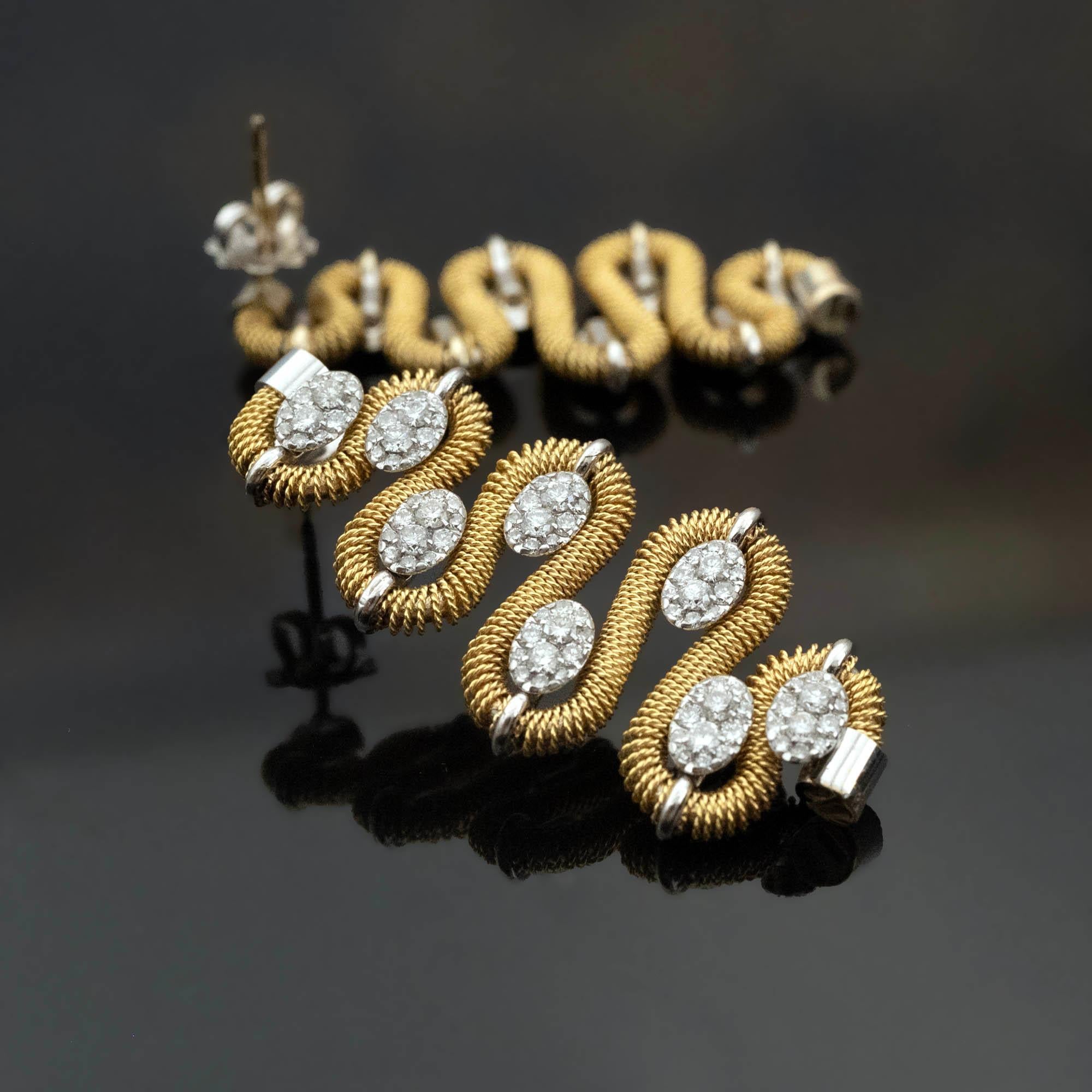 18 Karat Two-Tone Gold Diamond Drop Earrings by Marchisio, Italian Jewellers Since 1859

Elegant and dimensional, these 18 karat two-tone gold drop earrings were crafted in the workshops of Marchisio, a respected Italian jeweller founded in Turin in