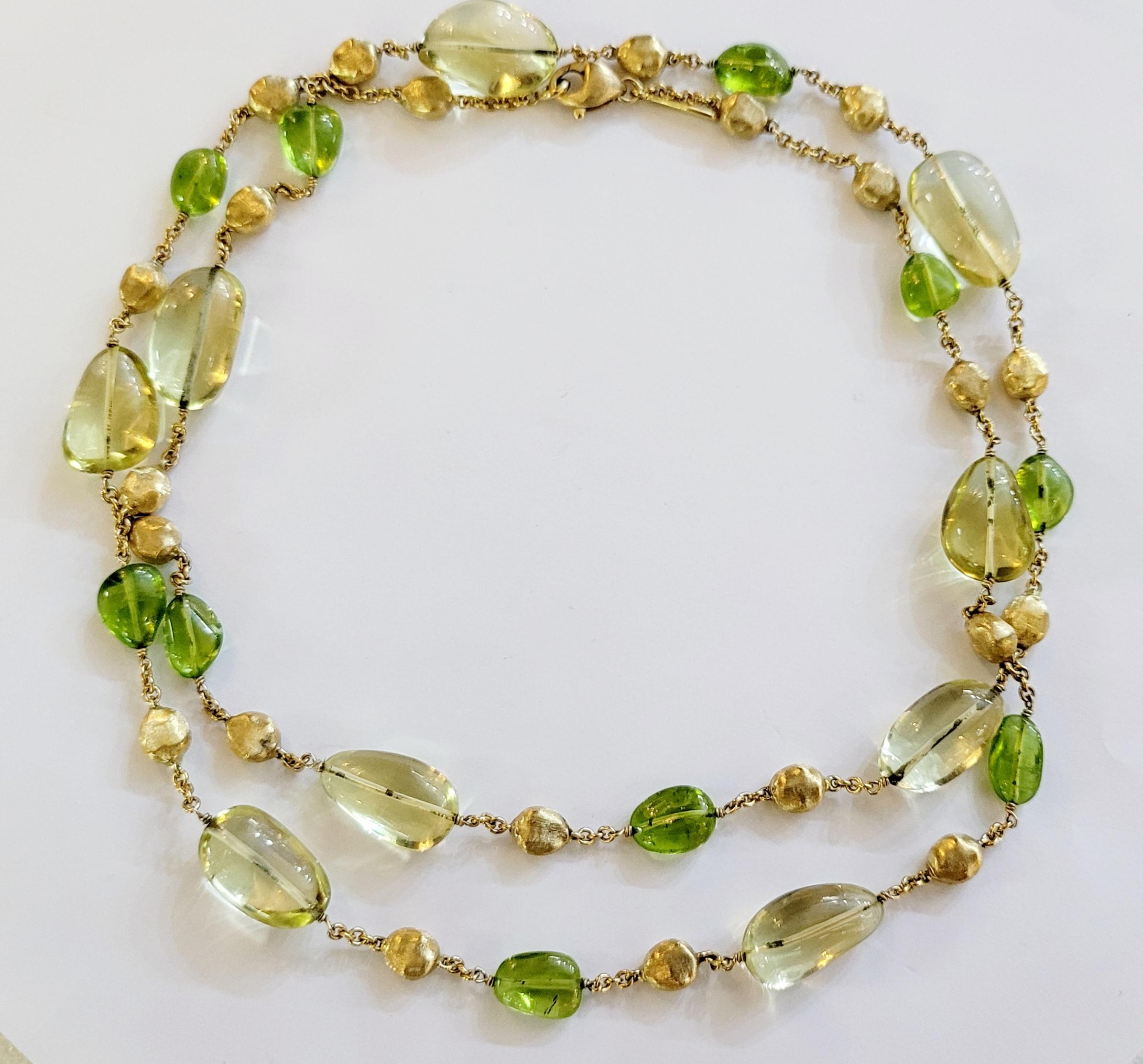 Authentische Halskette von Marco Bicego aus 18 Karat Gelbgold mit Perlen aus Citrin und Peridot. Die Halskette ist 31 Zoll lang.  Halskette Gewicht 49.8gr  
 CIRCA 2010's
Verkaufspreis $ 6500
