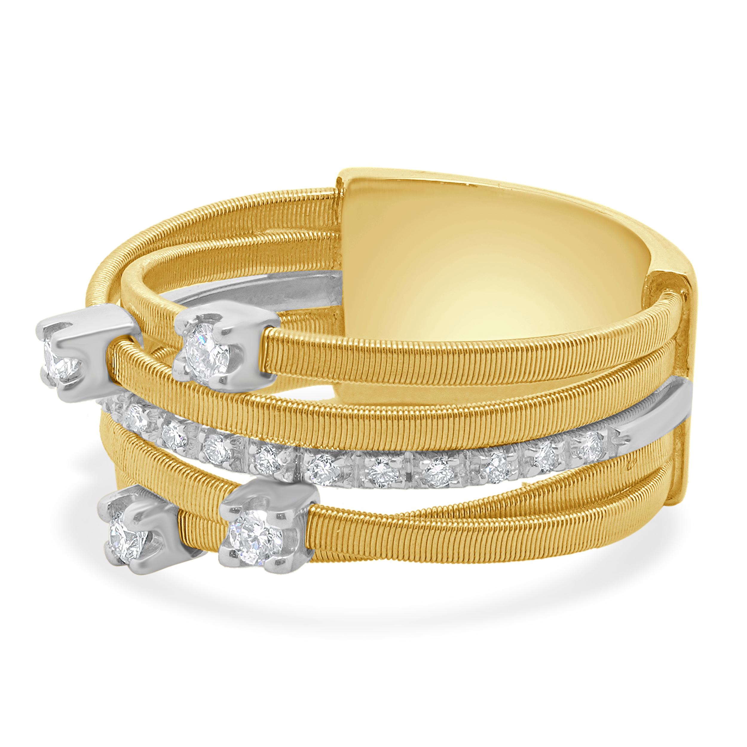 Designer: Marco Bicego
Materiale: Oro giallo e bianco 18k
Diamante: 21 tagli rotondi = 0,25cttw
Colore: G
Chiarezza: VS1
Misura dell'anello: 8.75
Peso: 8.75 grammi
