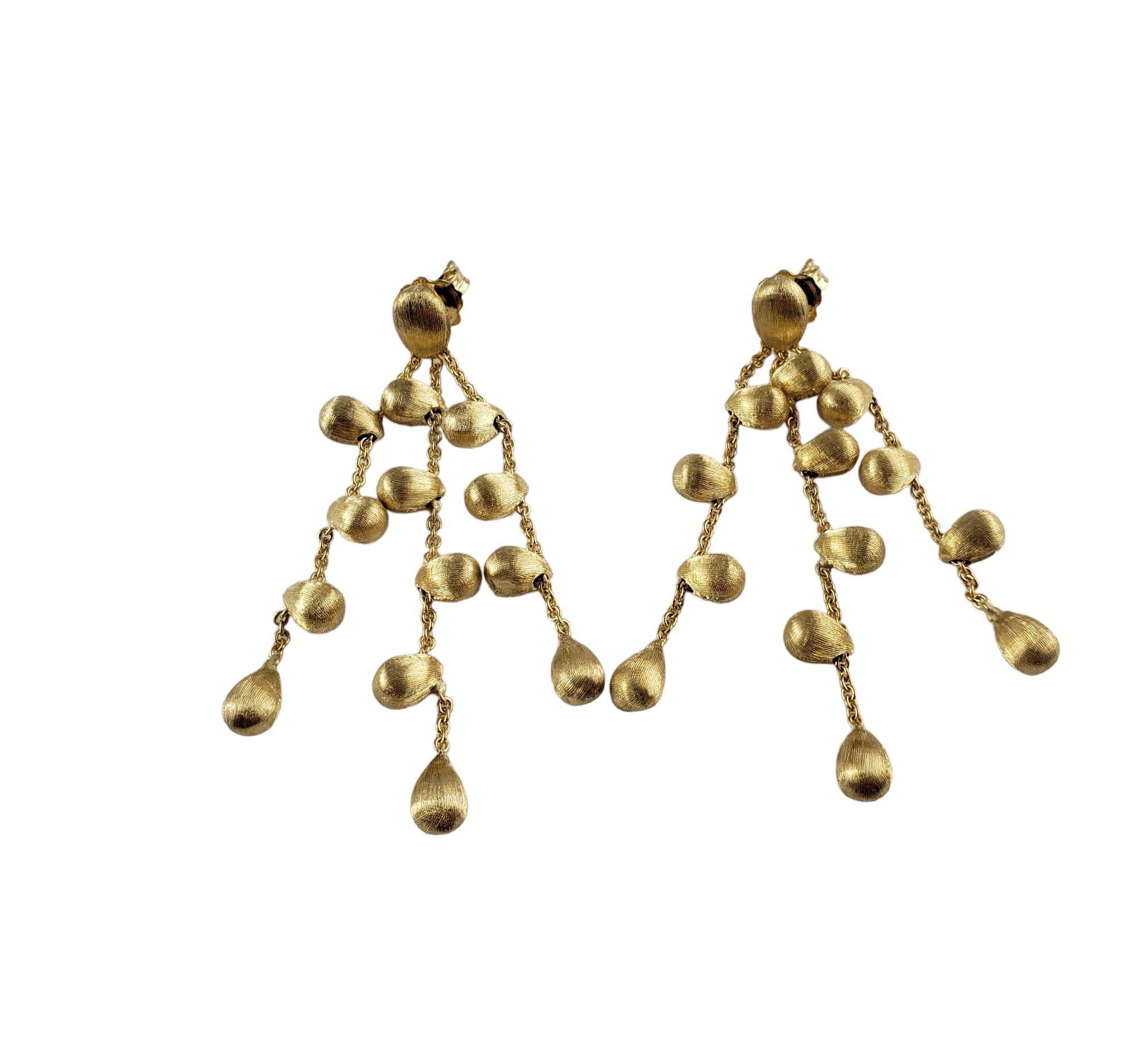 Marco Bicego 18 Karat Yellow Gold Triple Stand Siviglia Dangle Earrings-

These lovely triple strand dangle earrings by Marco Bicego are crafted in meticulously detailed 18K yellow gold.

Size:  2 inches 
        
Weight:  10.9 gr./  7.0