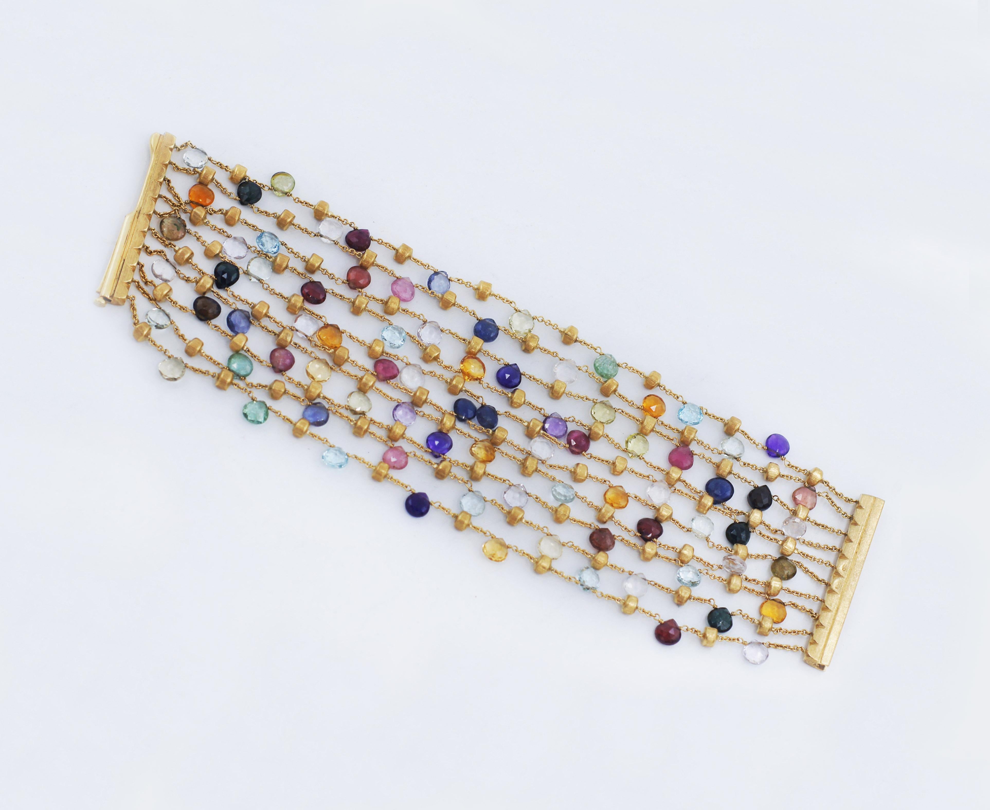 MARCO BICEGO 
Collection S S 
Pierres précieuses multicolores 
Bracelet 10 brins avec pierres semi-précieuses mixtes
Or jaune 18k 
Longueur : 7.25