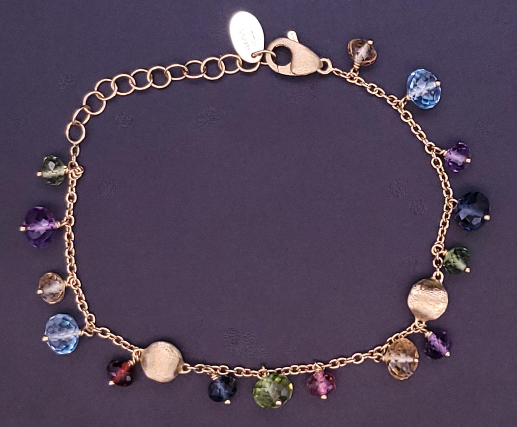 Marca Marco Bicego
Género Mujer
De la Colección África
Material Oro Amarillo 18K
Estado: Usado
Gema: Topacio, Amatista, Citrino, Turmalina, Granate, Peridoto
En forma de Piedra: Cuentas facetadas
Longitud: 5 1/2