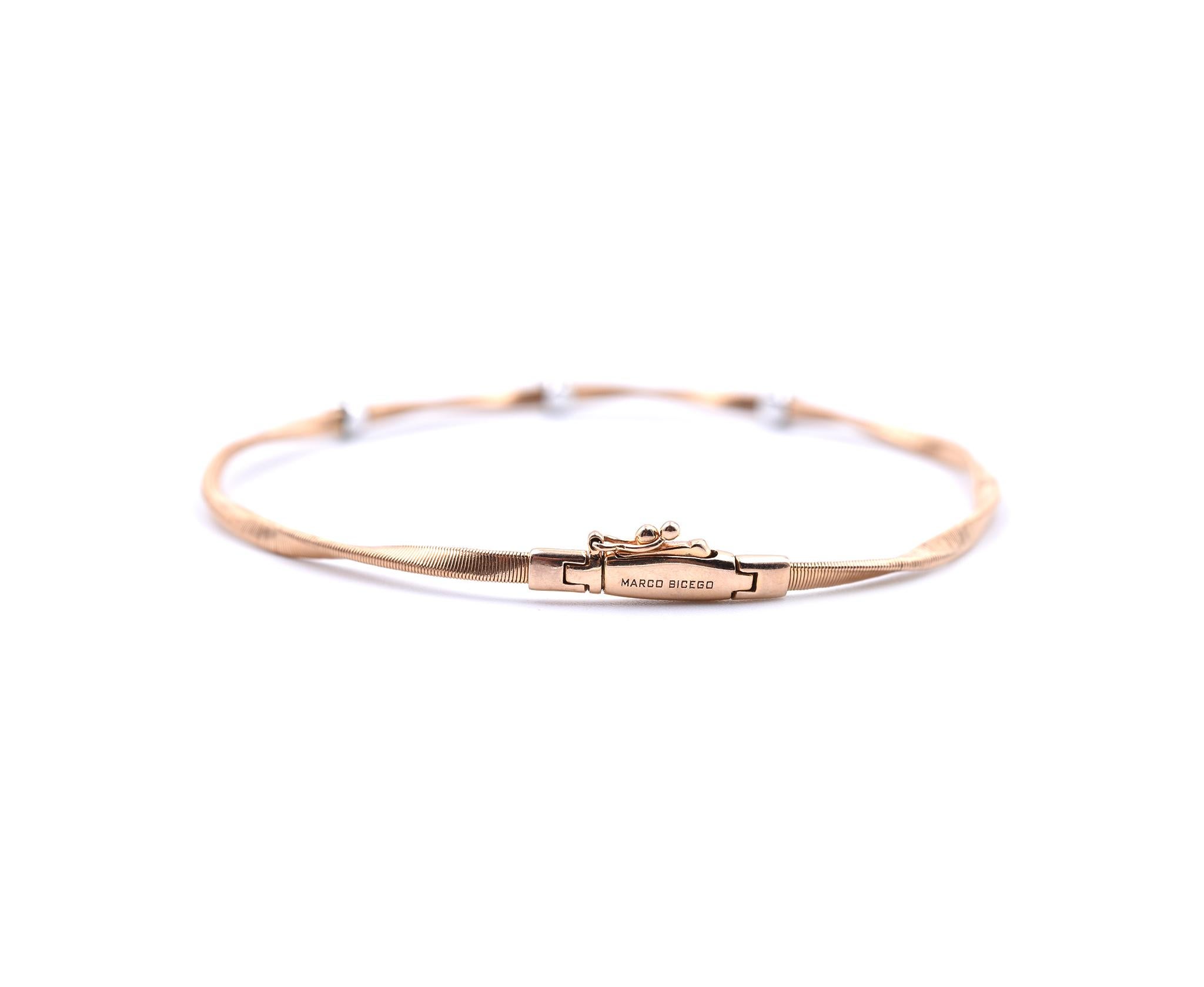 Designer: Marco Bicego
Material: 18k rose gold
Diamonds: 3 round brilliant cut=0.15cttw
Color: G
Clarity: VS
Dimensions: bracelet is 7-inches long and it is 3.92mm wide
Weight: 6.45 grams
