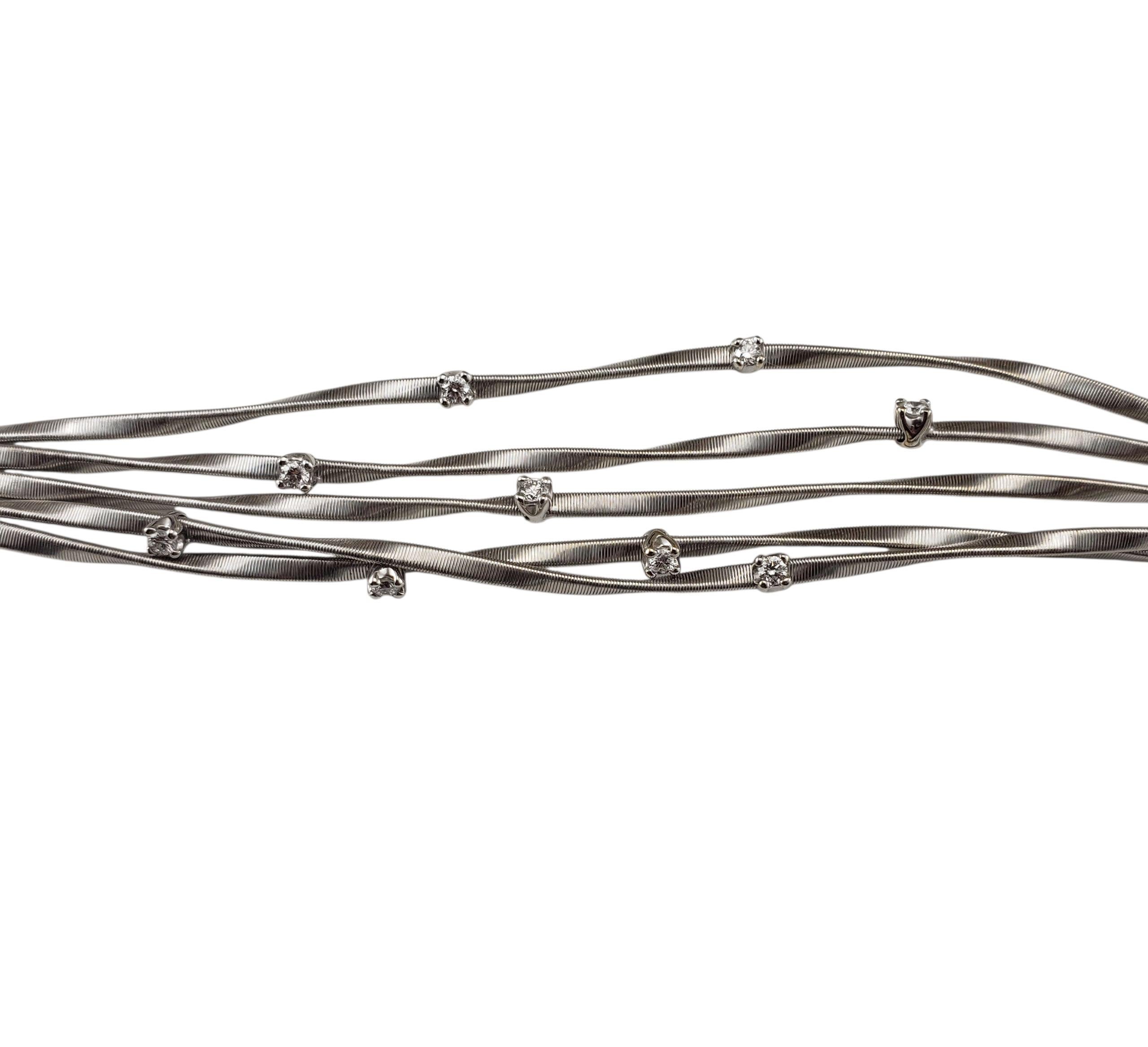 Marco Bicego 18K White Gold and Diamond Five Strand Marrakech Bracelet-

This stunning five strand bracelet by Marco Bicego features the brand's signature hand-twisted and coiled design in 18K white gold. Accented with nine round brilliant cut