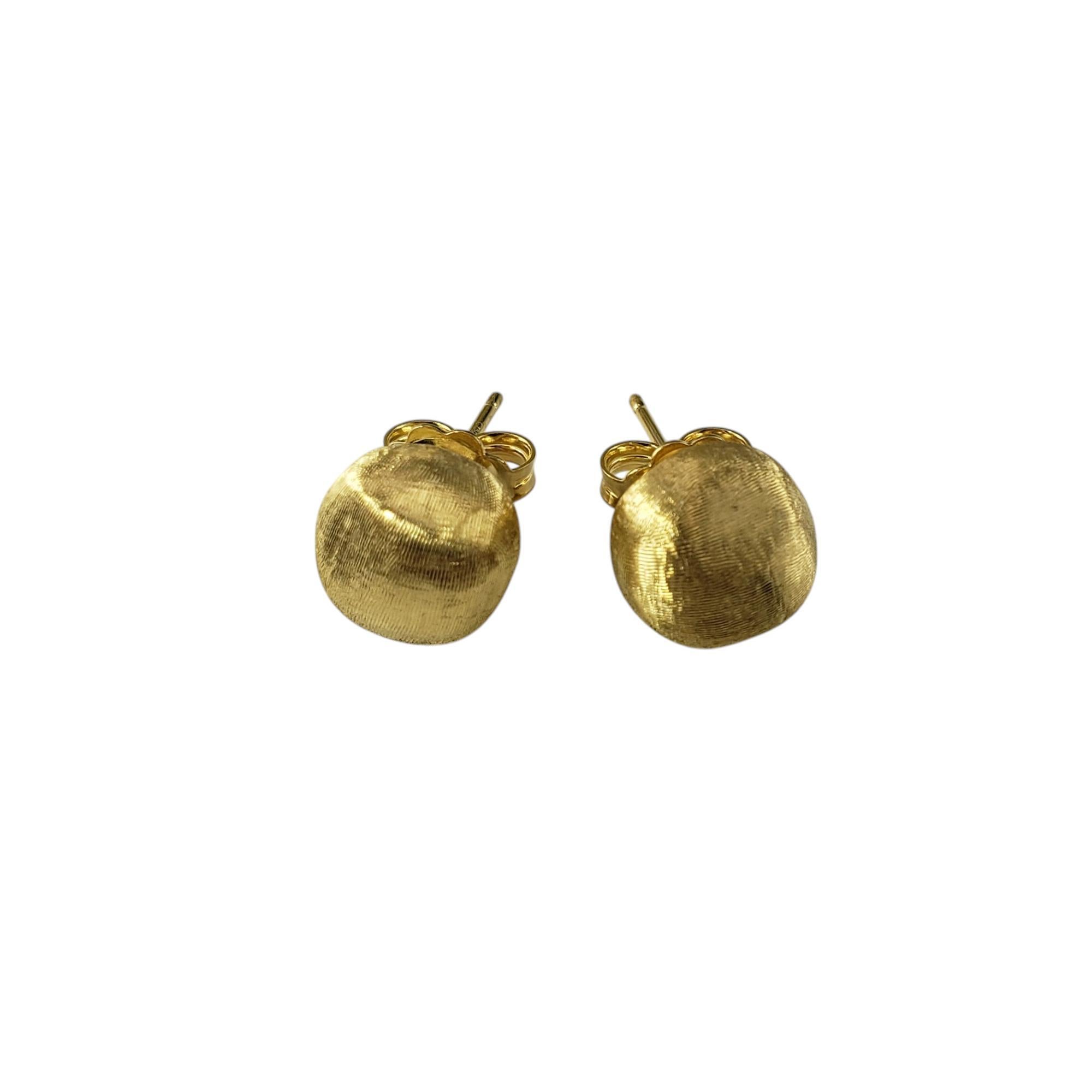 Marco Bicego 18K Yellow Gold Africa Stud Earrings-

These timeless 18K yellow gold stud earrings by Marco Bicego are hand-engraved using an ancient Florentine technique, giving them a fine brushed texture. Push back closures.

Size: 10 mm

Weight: