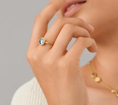 Marco Bicego, Anello Jaipur in oro giallo 18 carati e topazio blu