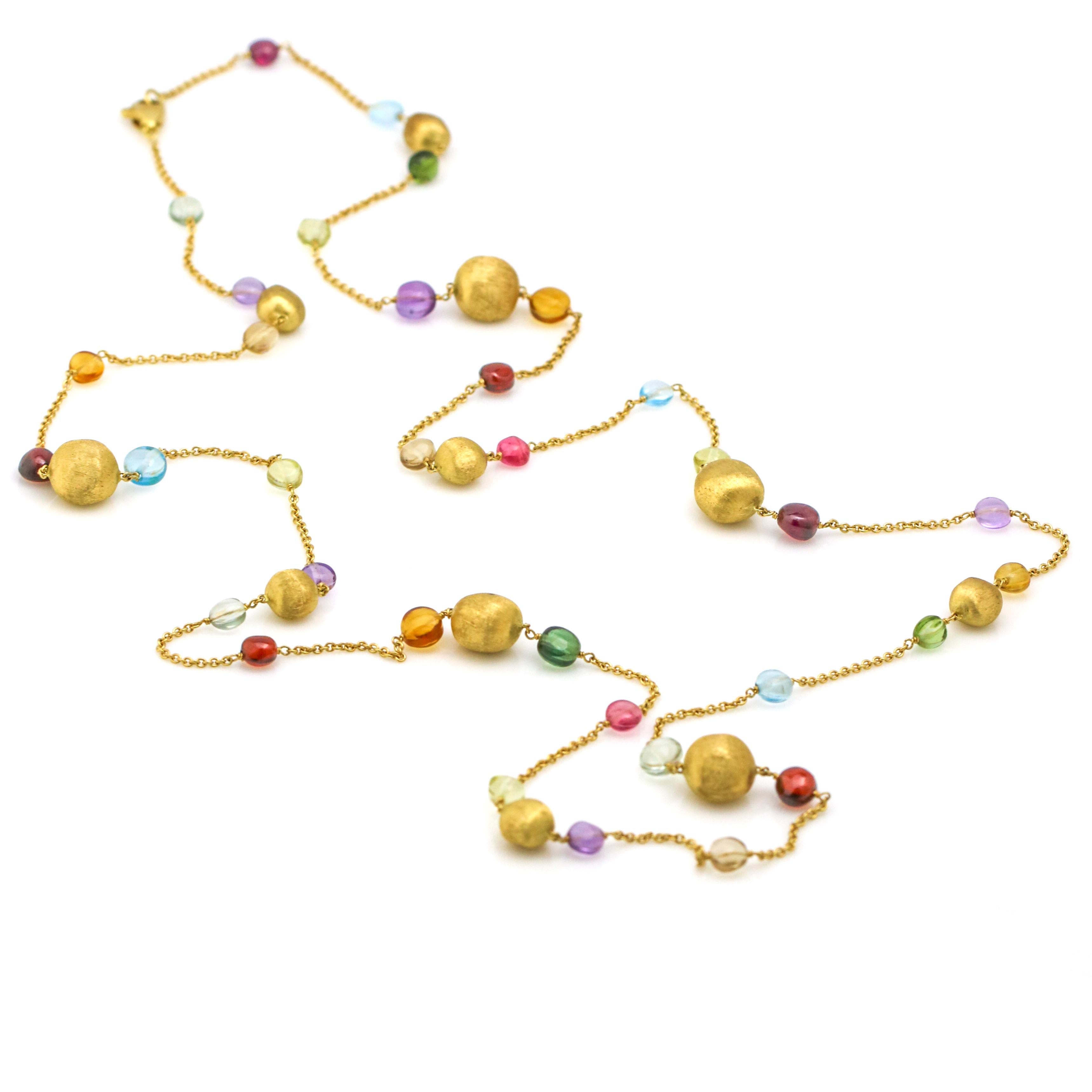 Marco Bicego Africa mixed gemstones and gold beads necklace in 18 karat gold. Lobster clasp.

Length, 36 inches.
Gold Beads, 10 mm - 7 mm.
Weight, 20.6 grams.

Previously owned, in excellent condition. Original box or pouch is not included. All