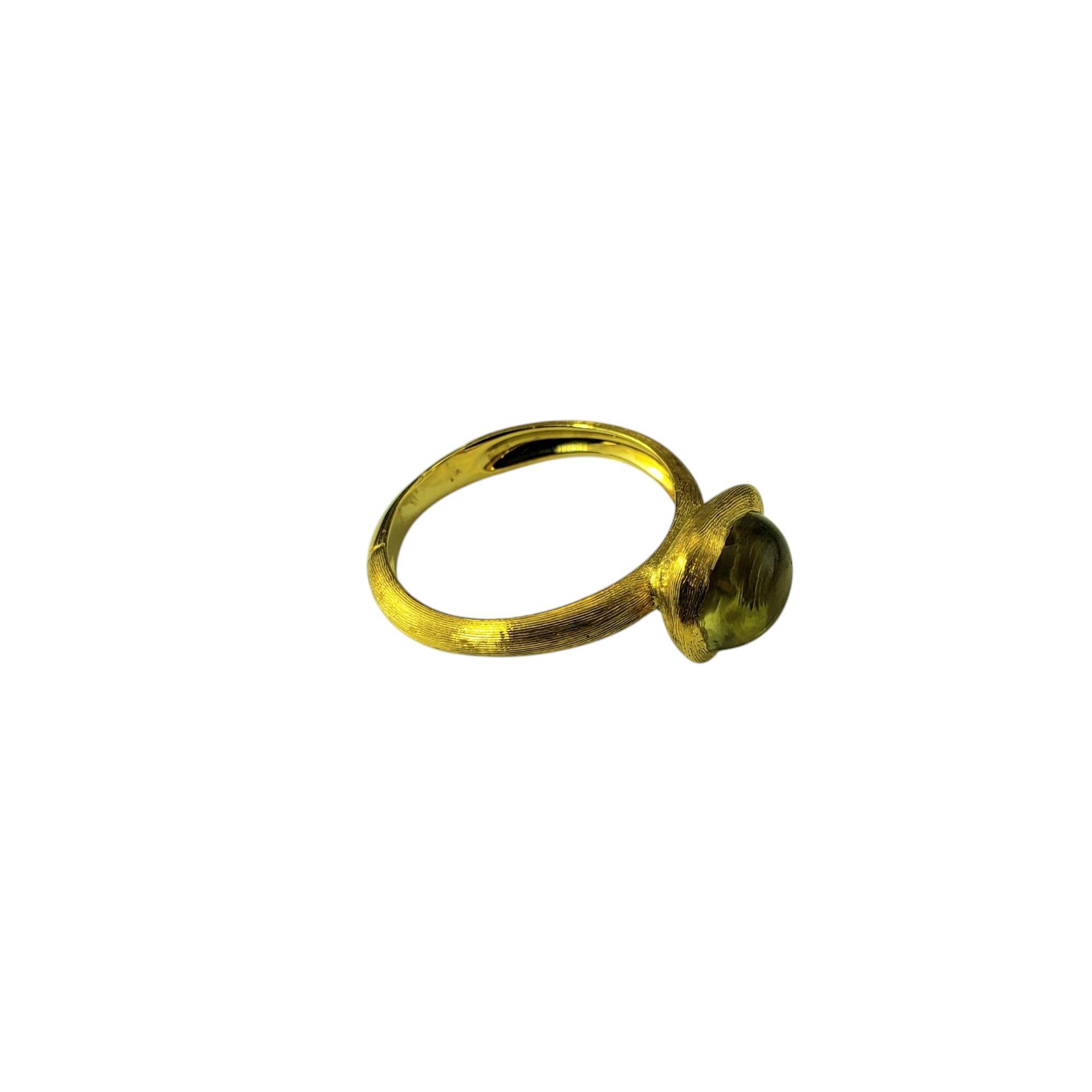 Marco Bicego 18K Yellow Gold and Cabochon Citrine Jaipur Frame Ring Size 7.5

This exquisite ring features a cabochon cut citrine gemstone (9 mm x 7 mm) set in a handcrafted 18K yellow gold. The frame showcases Bicego's signature Bulino engraving