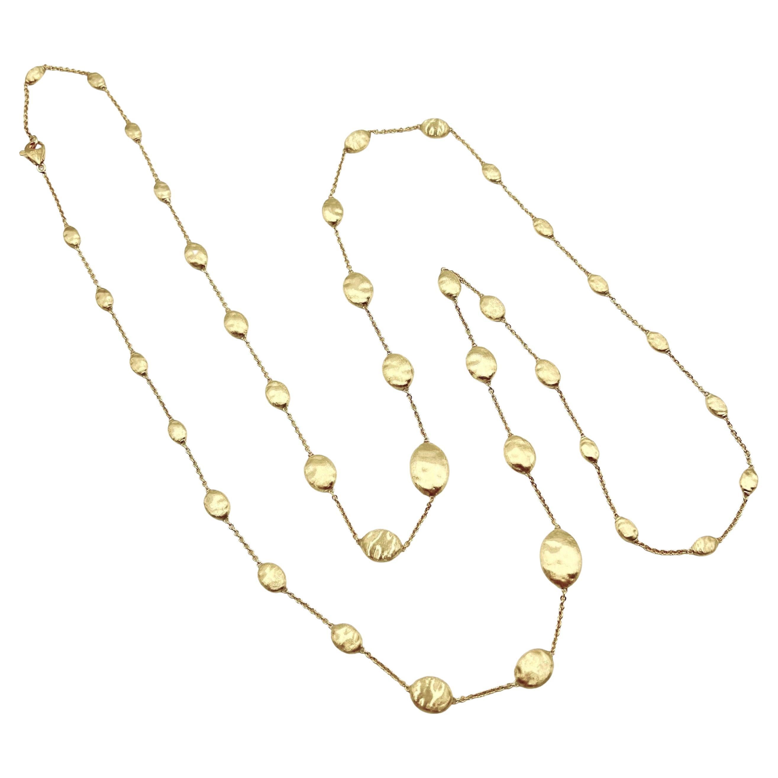 Siviglia large bead station necklace, featuring delicately hand-engraved 18k yellow gold beads separated by polished 18k yellow gold chain. Signed 