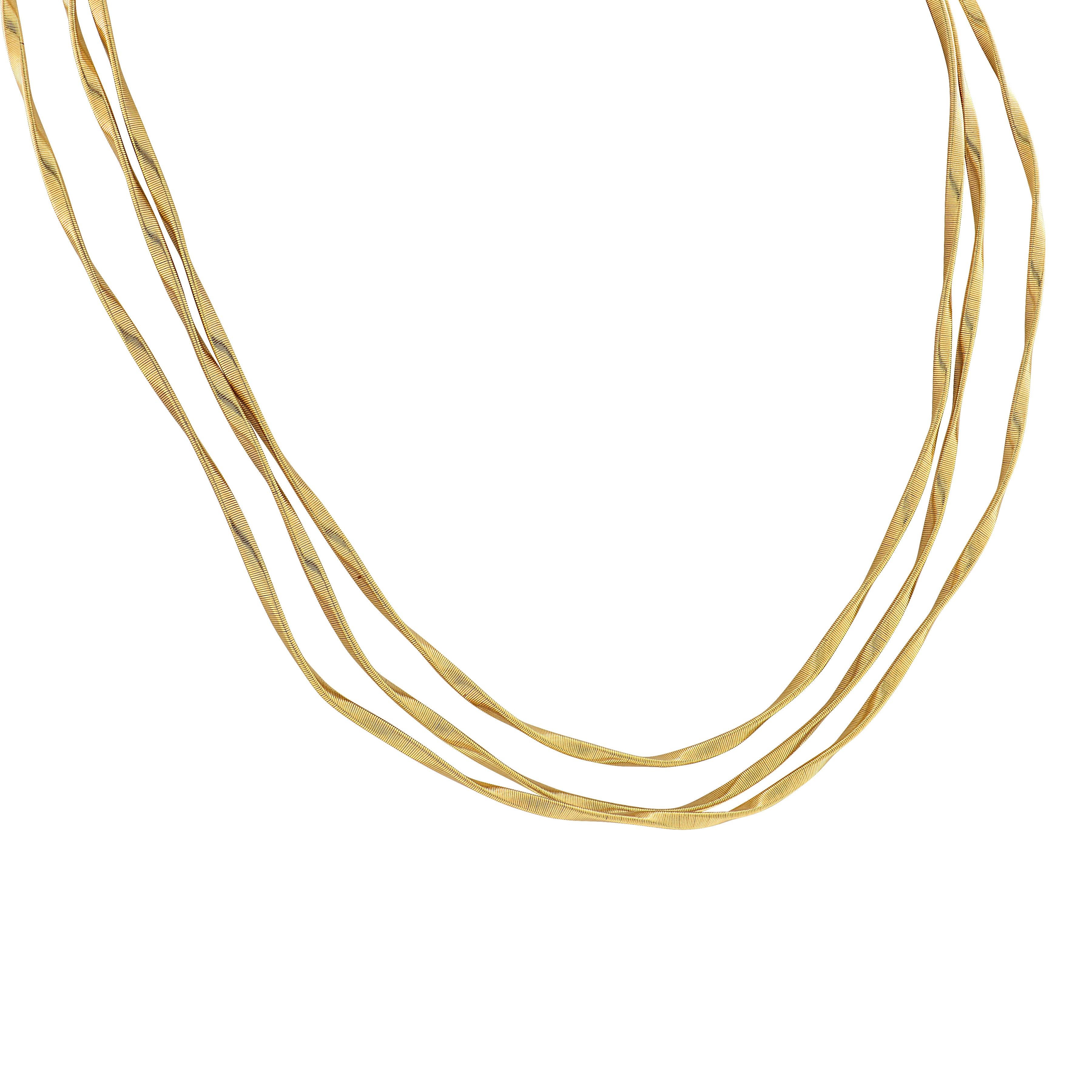 Confectionné en Italie par le célèbre designer Marco Bicego, ce collier remarquable est issu de sa collection emblématique Marrakech, le modèle même qui a lancé sa célèbre marque. Réalisé en or jaune 18 carats, il présente trois brins gracieusement