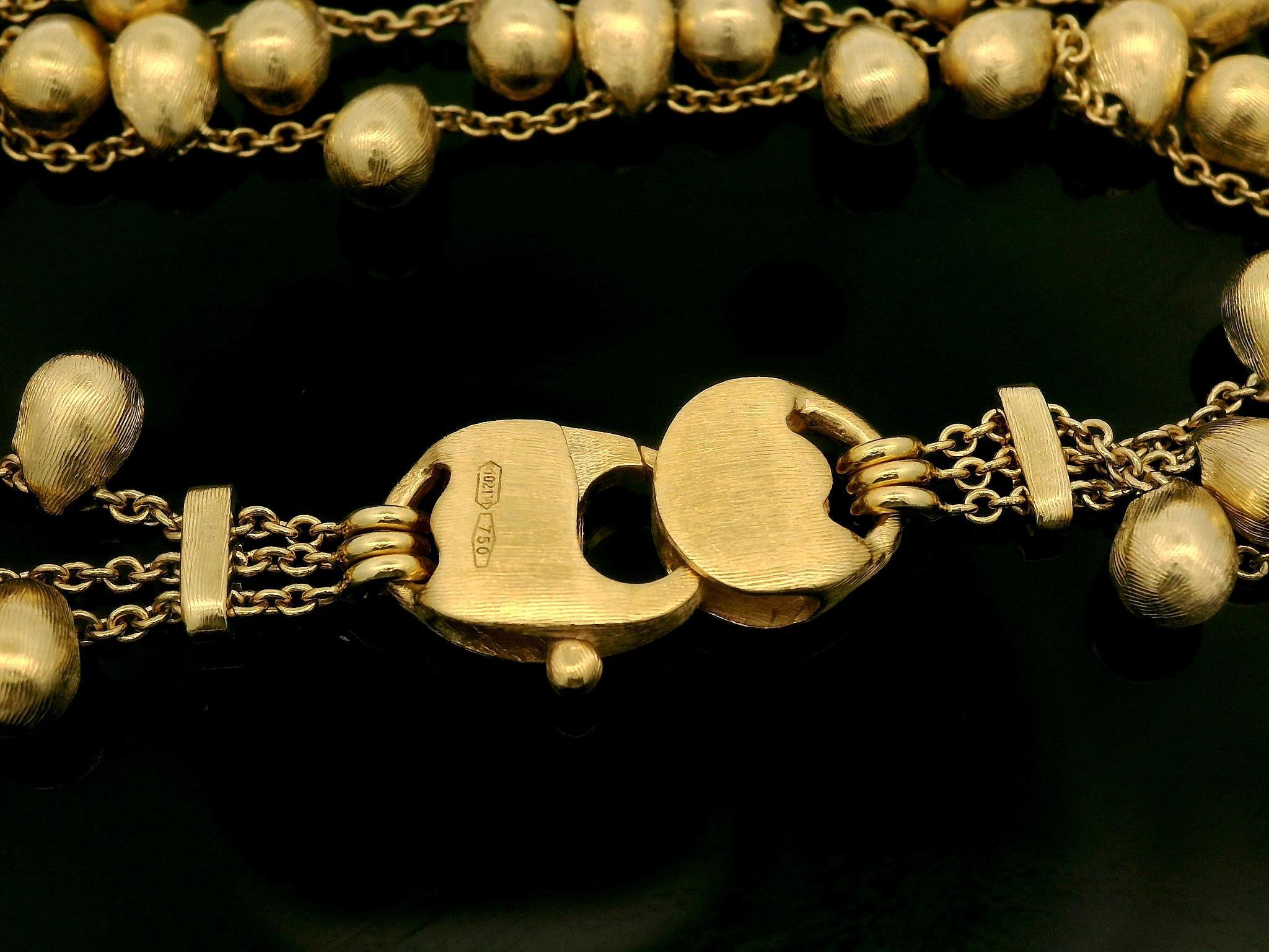 Material: Solid 18k Yellow Gold
Weight: 18.81 Grams
Dangle Dimensions: 6.4x4.5mm (0.25x0.17