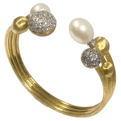 Bracciale in oro con diamanti e perle "Africa" di Marco Bicego