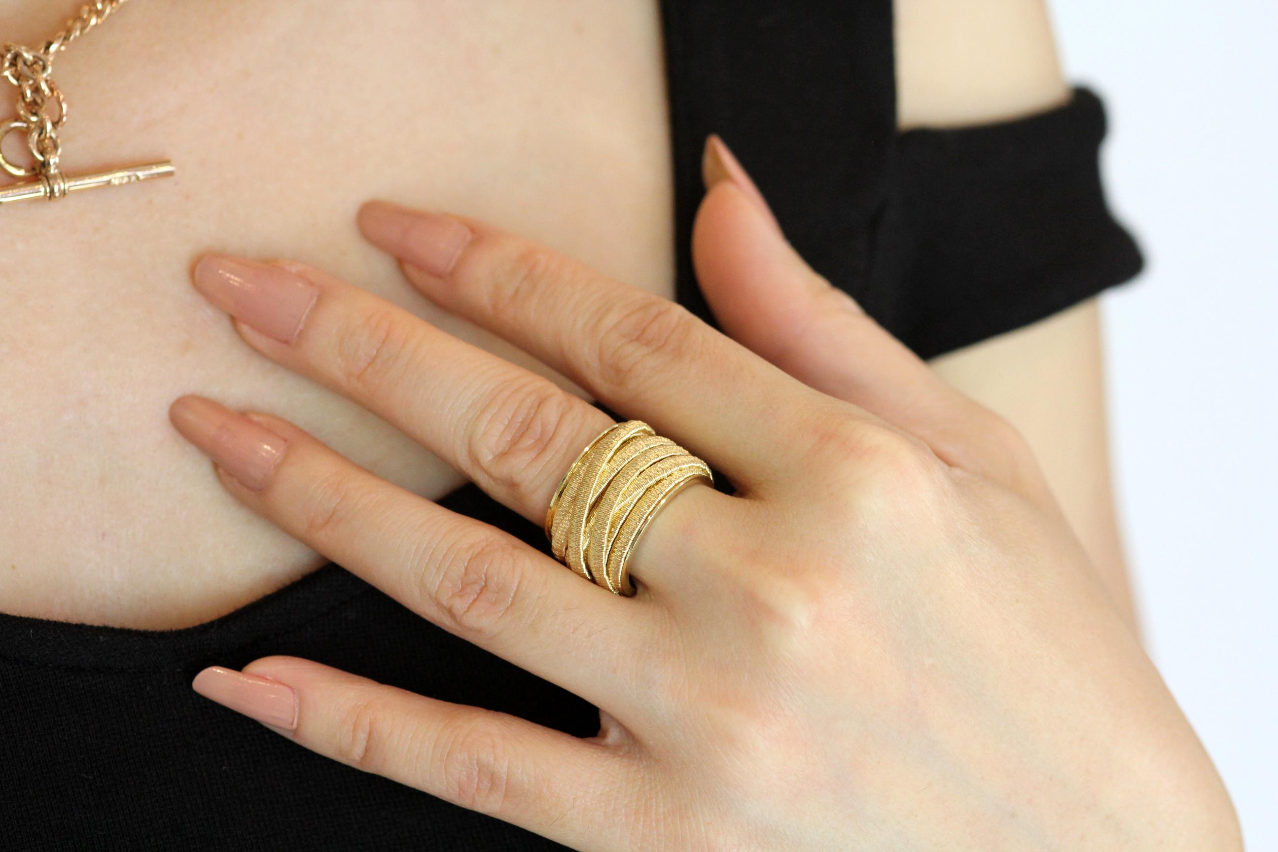 Marco Bicego, Cairo Collection 18 K Yellow Gold Nine Strand, Extra Wide ring. 
