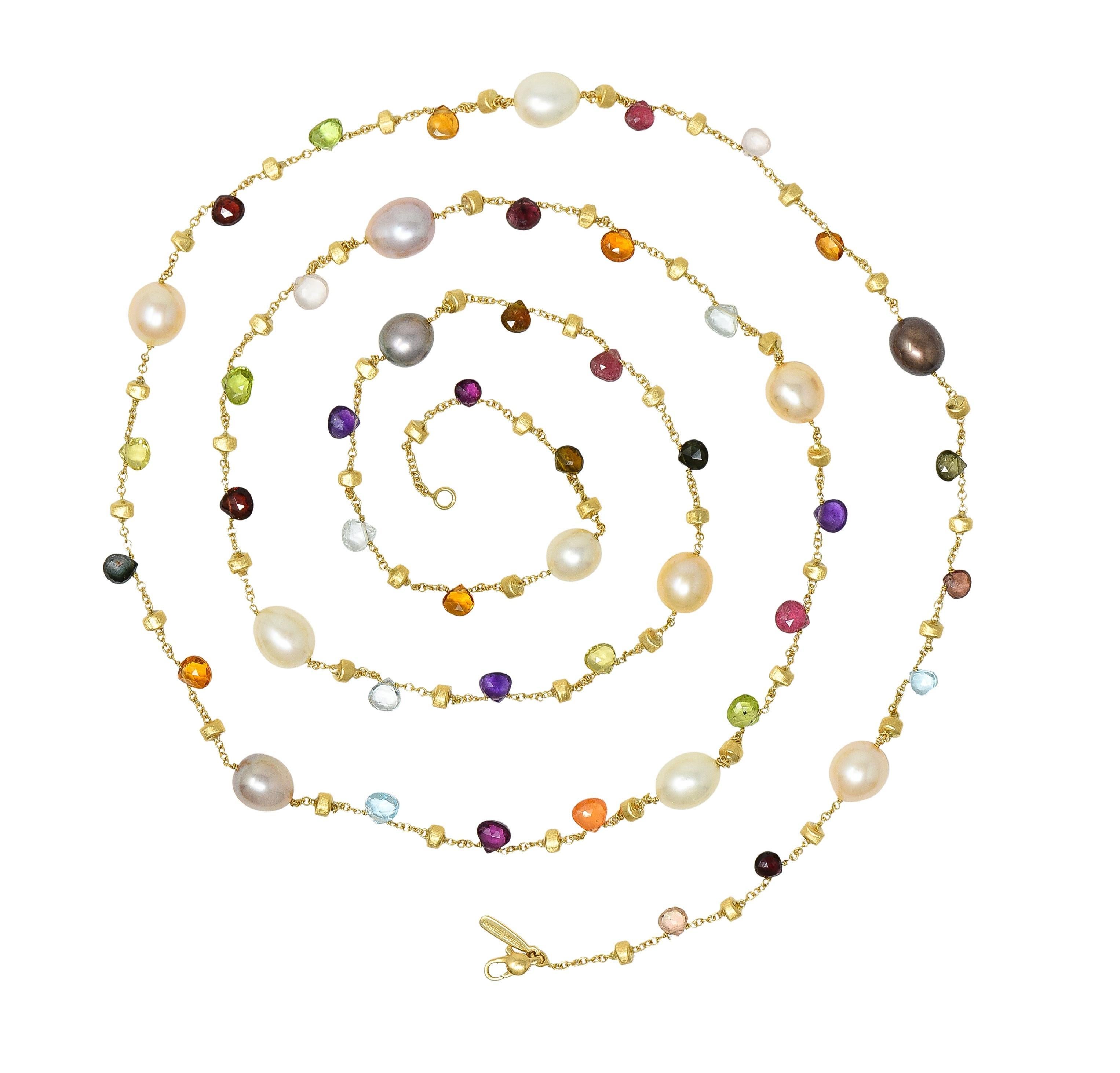 Featuring twelve baroque-shaped cultured pearl stations ranging in size from 8.0 to 9.0 mm
White, peach, pink, and black in body color with strong iridescence and excellent luster
Strung between amethyst, citrine, peridot, tourmaline, topaz, and