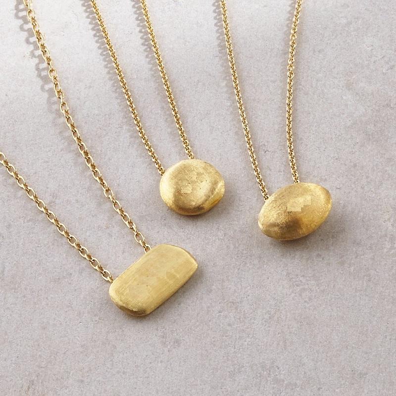 Marco Bicego Delicati in 18K yellow gold round bead pendant. Representing a tribute to the joy of traveling and the inspiration for Marco's most iconic collections, this Delicati Gold Necklace is hand engraved by Italian artisans. 
Pendant size: