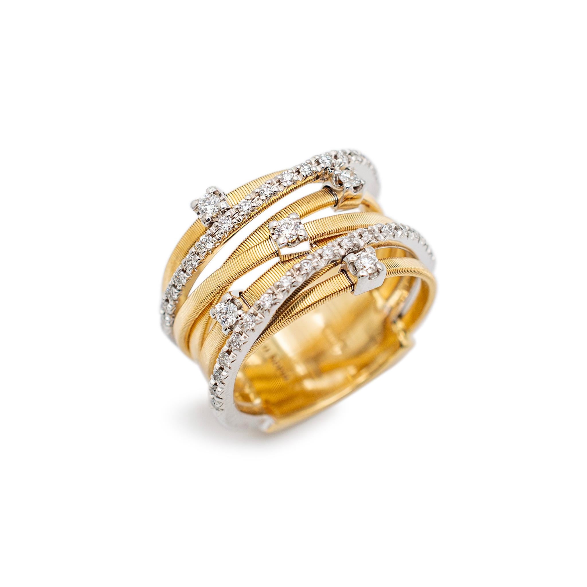 Brand: Marco Bicego

Gender: Ladies

Metal Type: 18K White & Yellow Gold

Size: 6.5

Shank Maximum Width: 13.15 mm

Weight: 11.10 grams
Ladies 18K white & yellow gold diamond cocktail ring with a comfort-fit shank. Engraved with 