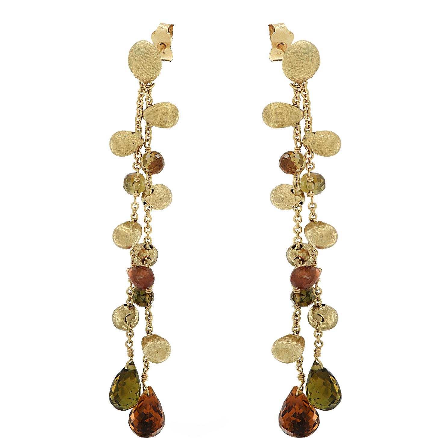 Stunning Marco Bicego Paradise double strand dangle earrings crafted by hand in Italy in 18 karat yellow gold detailed with peridot and citrine briolettes weighing approximately 10 carats total, interspersed with hand engraved yellow gold