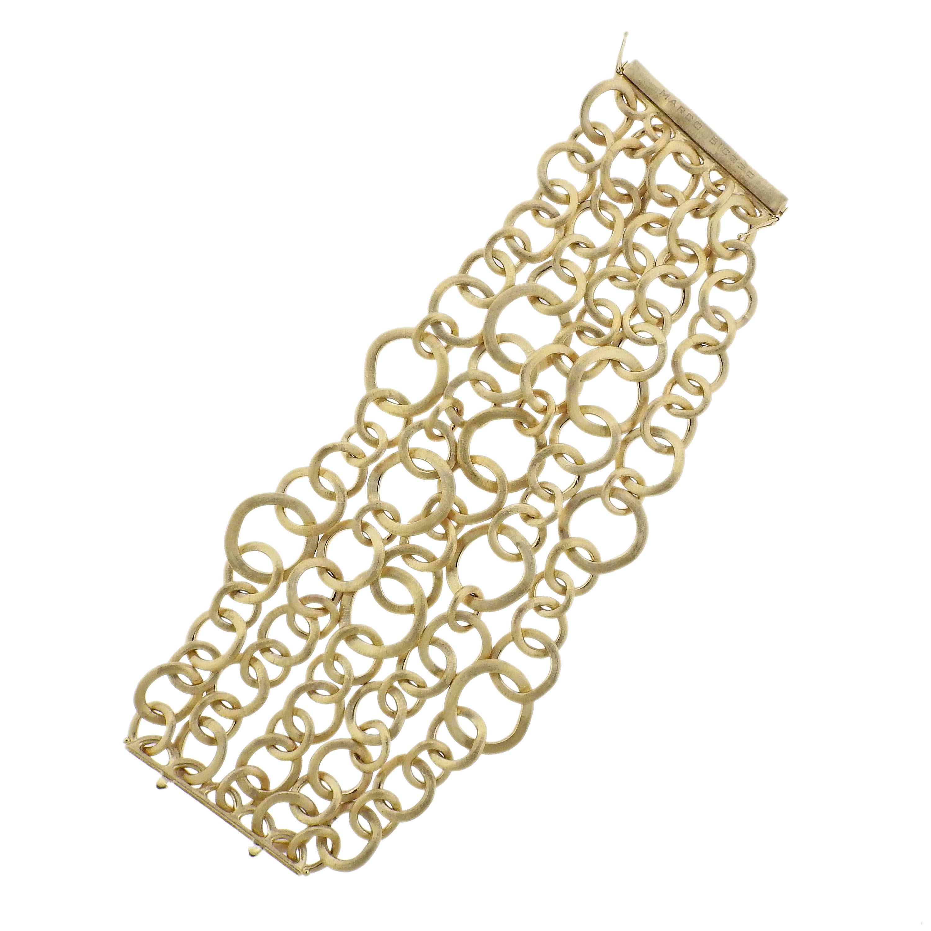 Marco Bicego Jaipur collection 18K yellow gold multi strand circle link bracelet. Bracelet measures 8