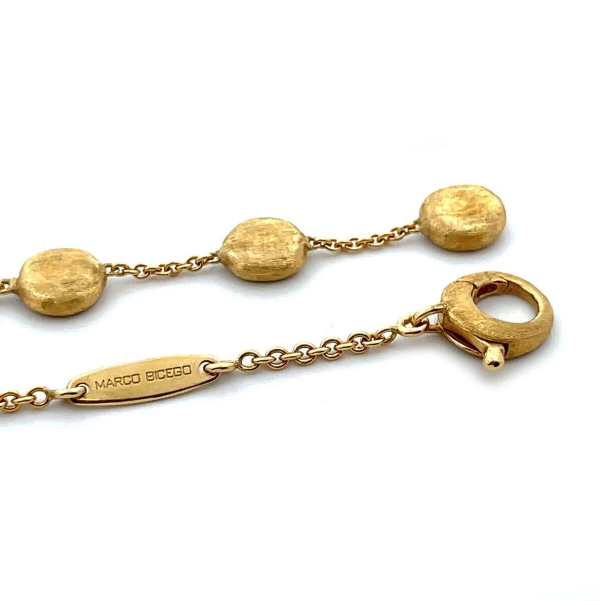 Brand: Marco Bicego
Hallmark: Marco Bicego Made in Italy 750
Main Stone:  mother of pearl
Material:  18k yellow gold
Measurement: chain: 17