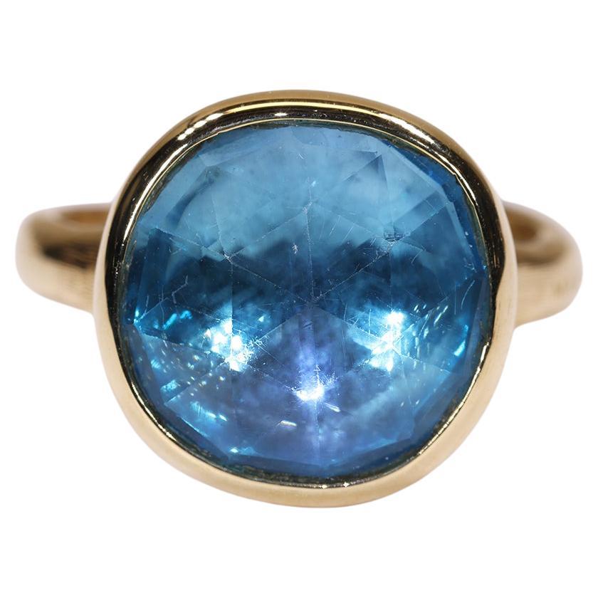 En vente :  Marco Bicego Bague en or jaune 18 carats avec grande topaze bleue