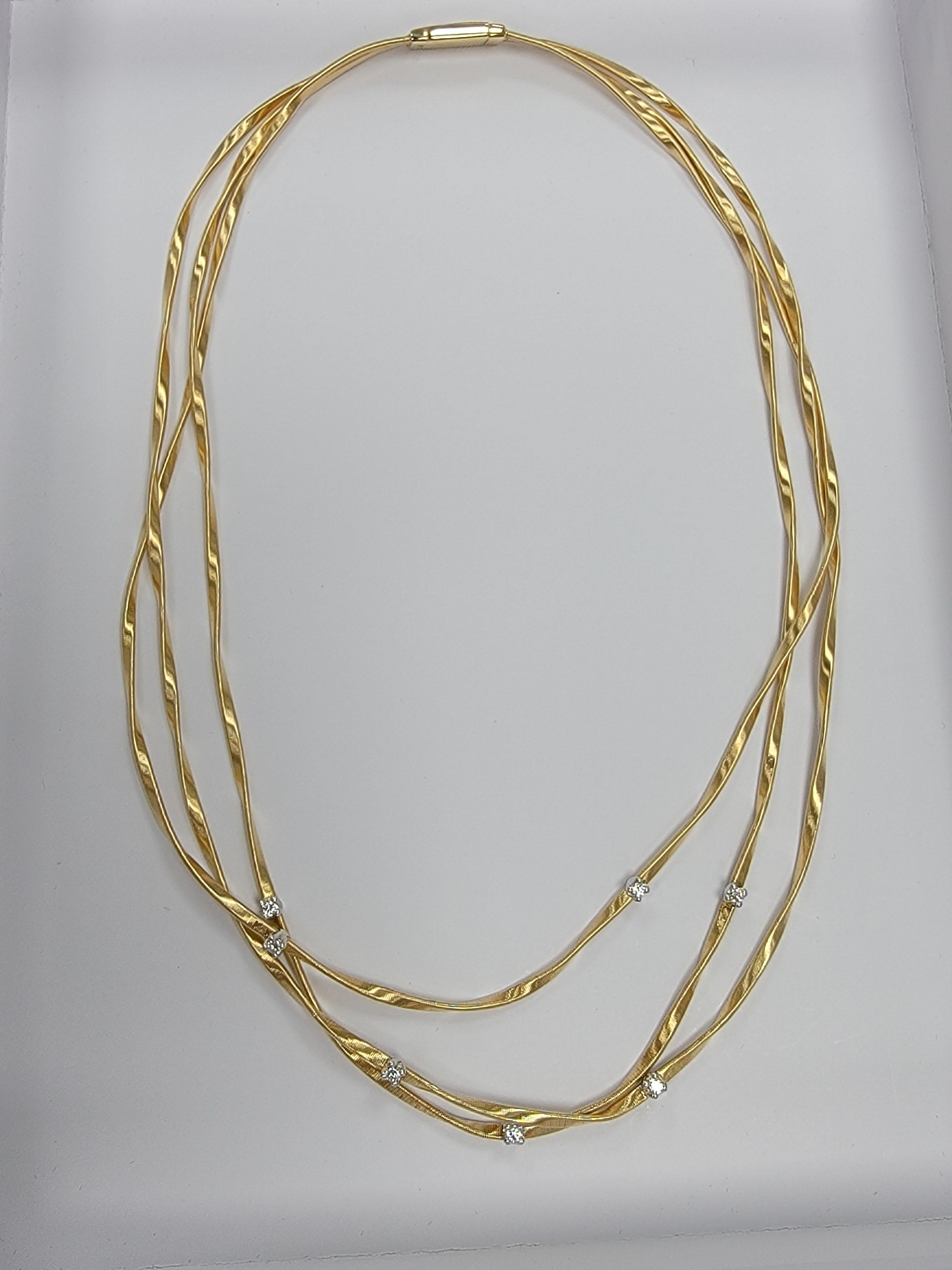 18K yellow gold three strand necklace with brilliant cut diamonds. This Marrakech Diamond Necklace is formed from hand hammered and hand twisted strands of gold created through Marco's signature 'corda di chitarra' technique. Total diamond weight: