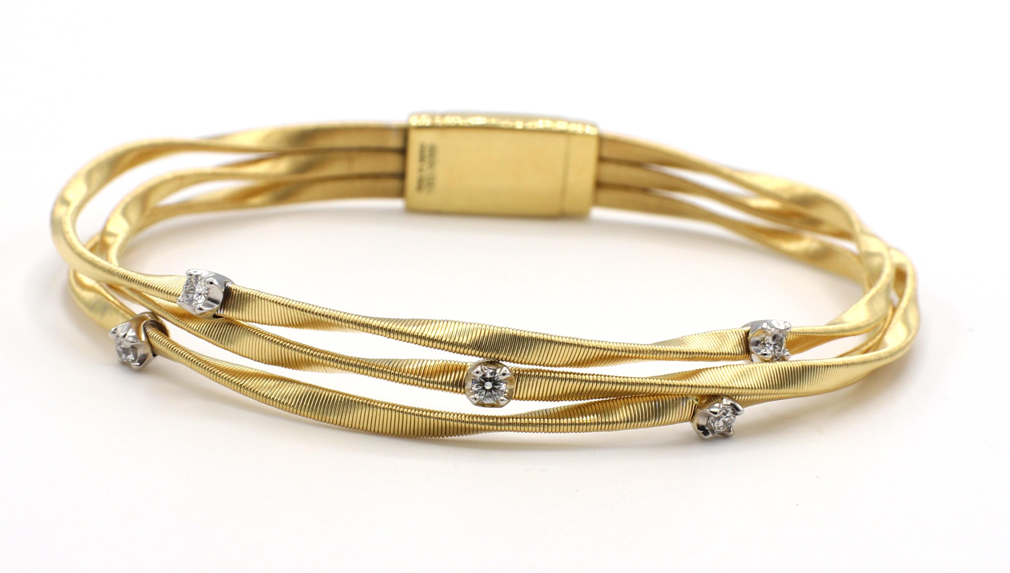 Marco Bicego Marrakech Drei-Strang-Diamant-Gelbgold-Armband
Metall: 18k Gelbgold
Gewicht: 18.13 Gramm
Diamanten: Ca. .25 CTW G VS
Länge: 7 Zoll
Einzelhandel: $6.450 USD