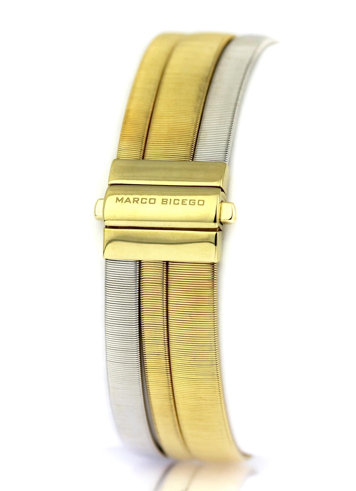 Marco Bicego, bimetal 18 carat yellow and white gold three row/strand crossover bracelet.
