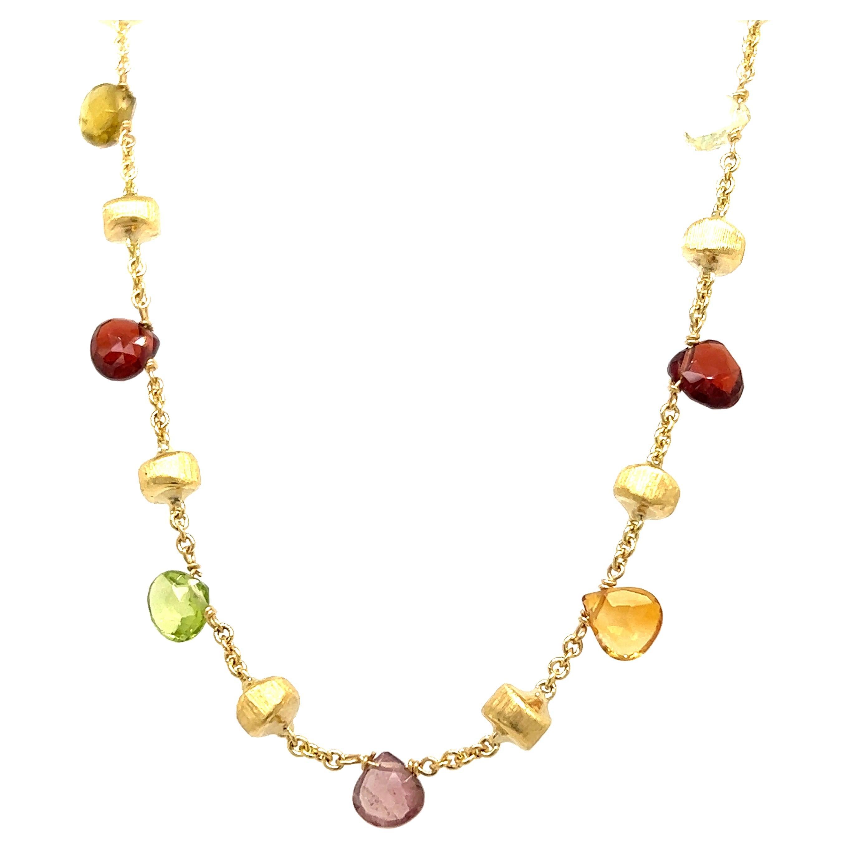 One 18-karat yellow gold multi-gemstone necklace, handcrafted in Italy by Marco Bicego from the Paradise collection. The necklace features twenty-two briolette cut gemstones, including amethysts, tourmaline, citrine and blue topaz, alternating with