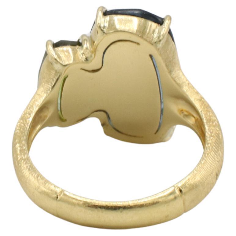 Anello con gemma di tormalina blu e verde di Marco Bicego Murano in oro giallo 18 carati
Metallo: oro giallo 18 carati
Peso: 8,37 grammi
Dimensione: 7 (US)
Parte superiore: 15 x 16,5 mm
Firmato: Marco Bicego 750
TTD F35001151
