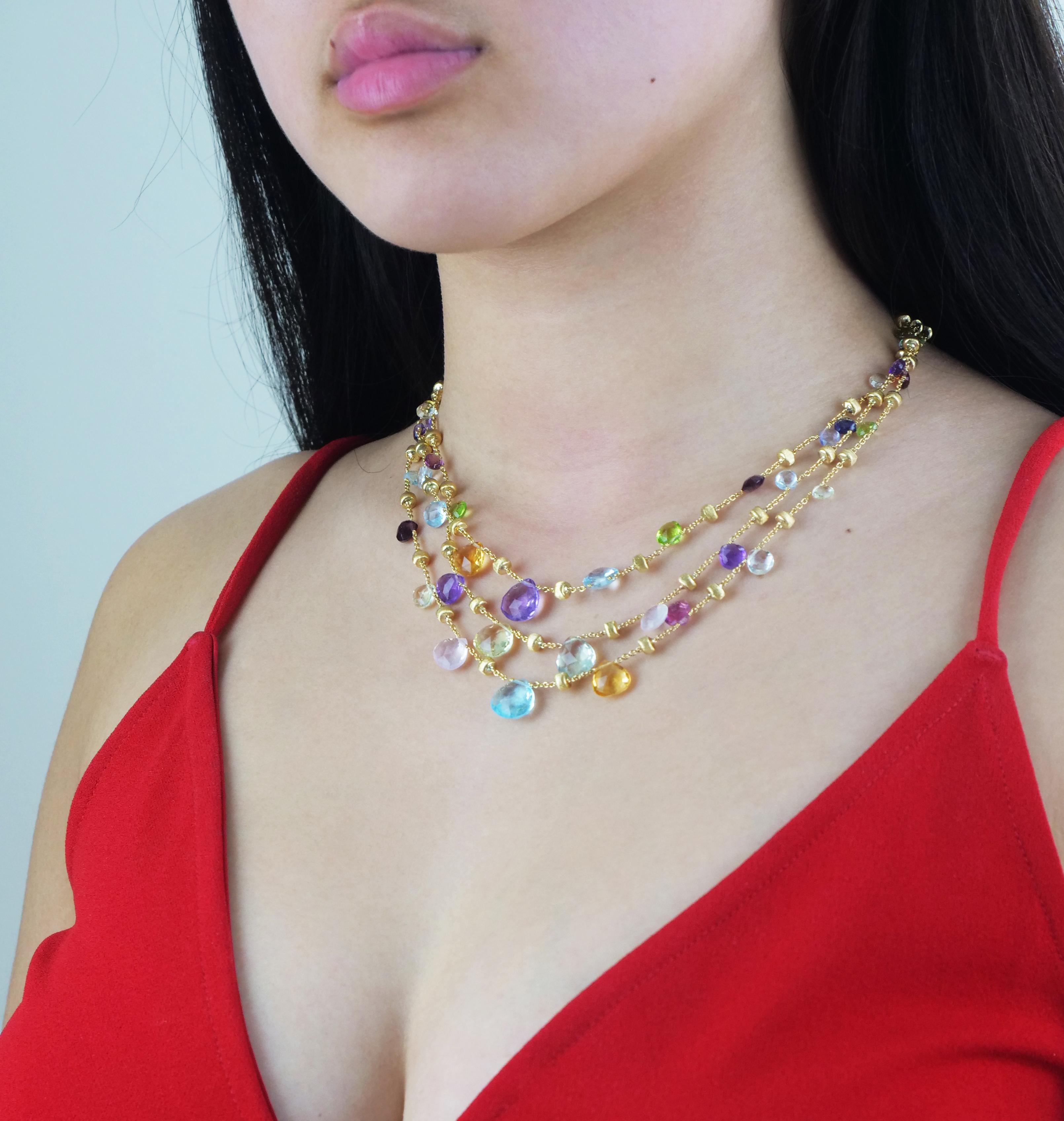 Marco Bicego Paradise 18ct yellow gold mixed stone graduated three strand necklace
The Marco Bicego Paradise collection showcases a spectacular array of multi coloured gemstones joined together to create these jewellery masterpieces. The Marco