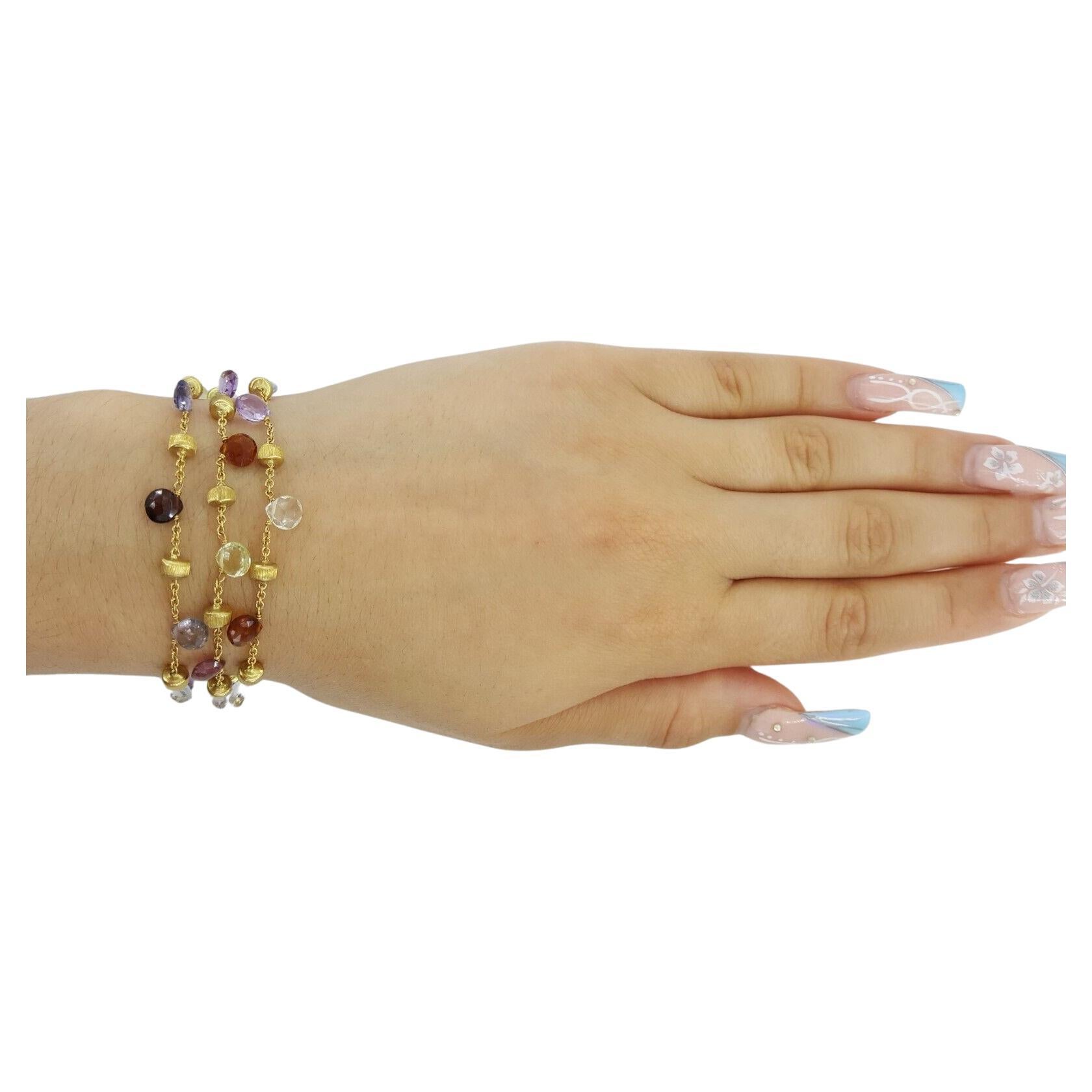 Marco Bicego Paradies 3 Strang Multi-Colored Edelstein Armband 18k Gelbgold
Das Armband wiegt 15,9 Gramm, ist 7,25