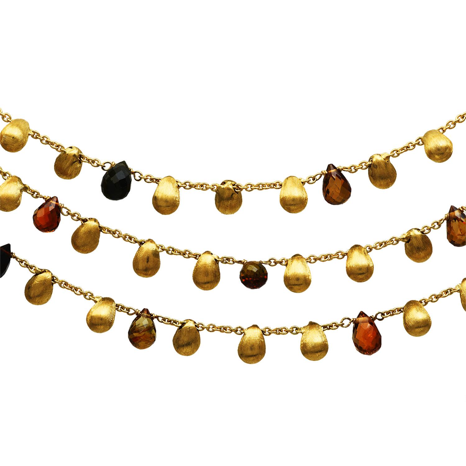 The overlapping of color and gold, with the strand design.

This exquisite necklace is crafted from his Paradise collection in solid 18K yellow gold, with textured beaded accents. a three-strand design 16