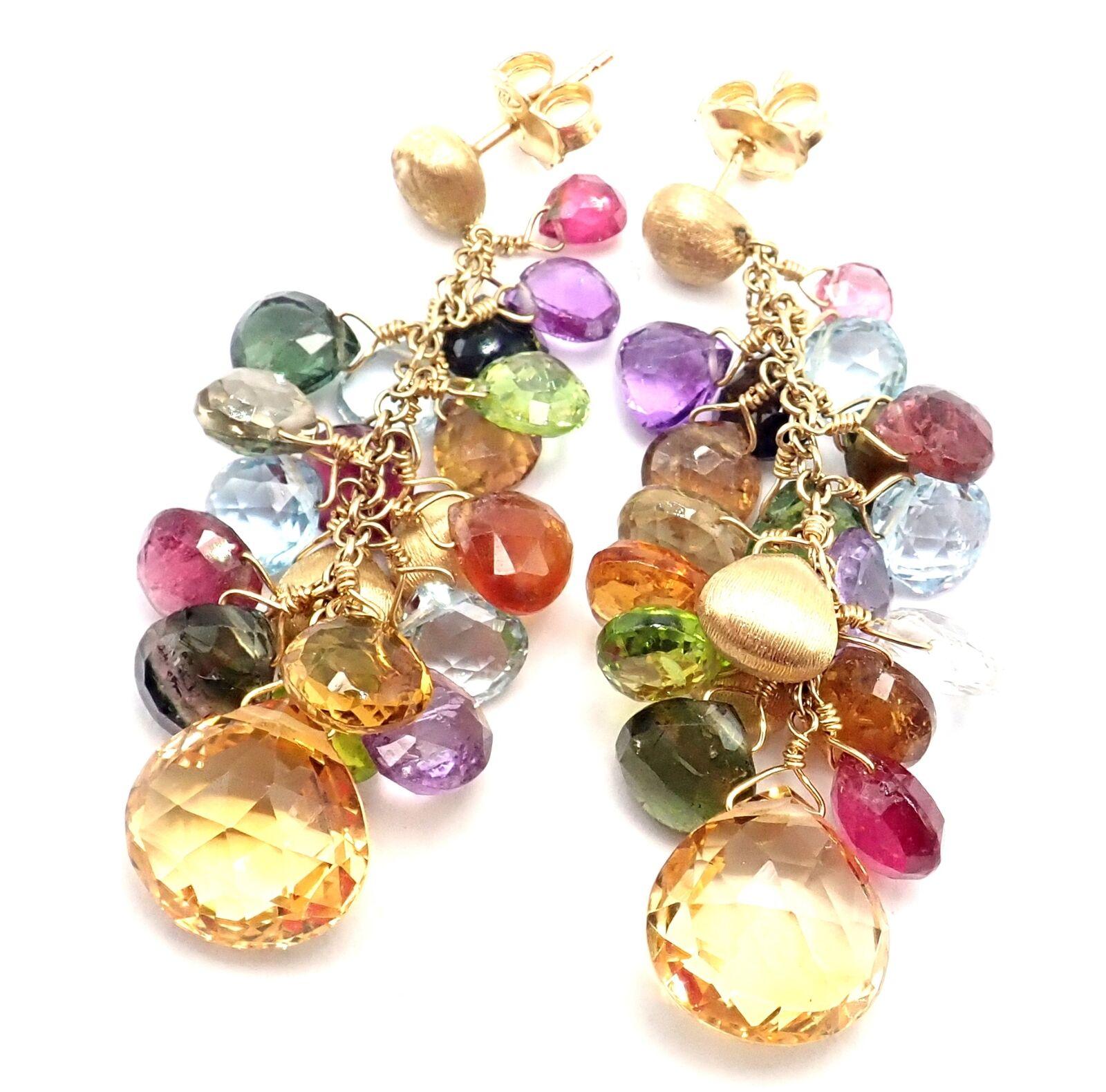 18k Yellow Gold Paradise Multicolor Gemstone Earrings by Marco Bicego.  
The Marco Bicego Paradise necklace is a stunning and colorful piece of jewelry that features five strands of multicolored gemstones strung together on an 18k yellow gold chain.