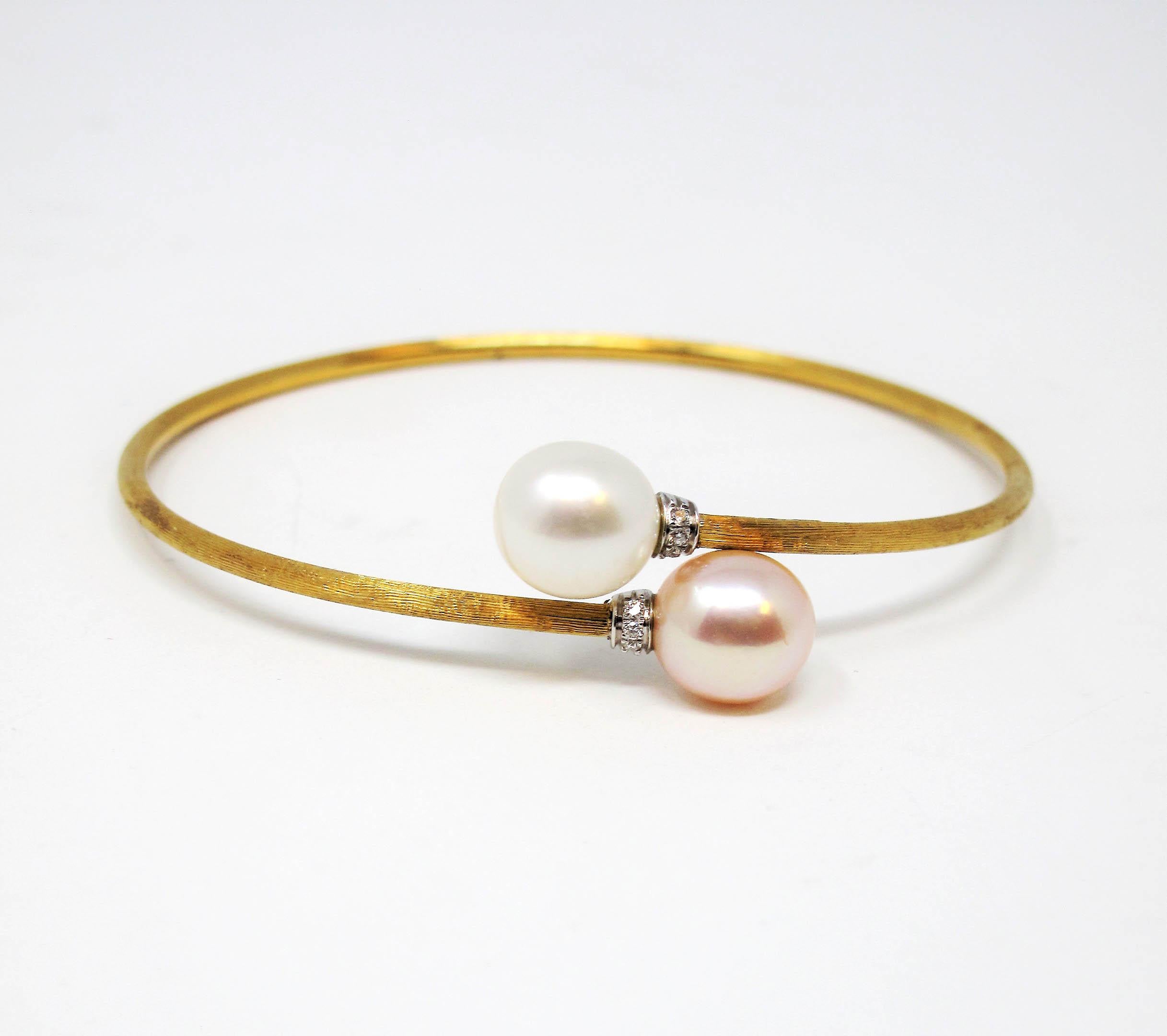 Gorgeous, ultra feminine diamond and cultured pearl bracelet by Italian jewelry designer, Marco Bicego. With its ultra thin band, soft pink and white pearls, and just a touch of diamond sparkle, this bracelet is the perfect choice for an understated
