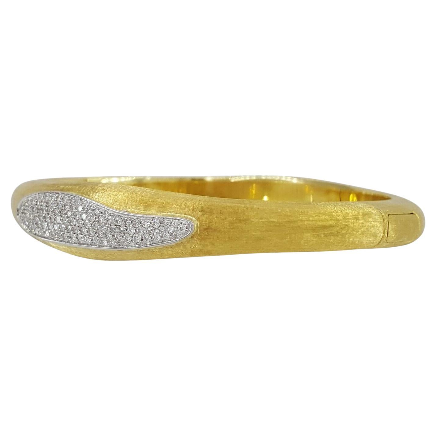 MARCO BICEGO 0.75 ct Pave Set Diamond 18k Yellow Gold Cuff Bangle
28 grams of 18 carats yellow gold
