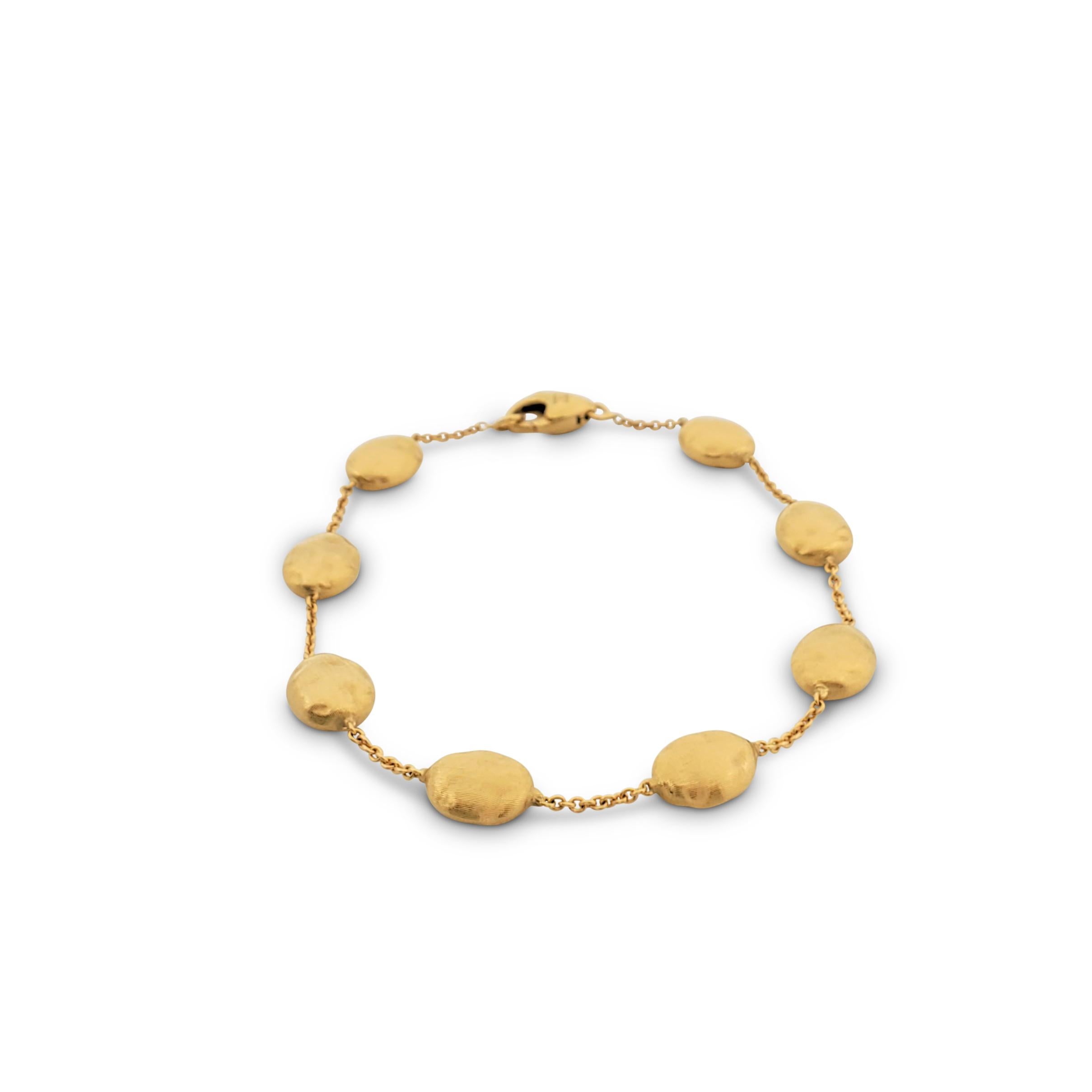 Authentic Marco Bicego 'Siviglia' bracelet crafted in 18 karat yellow gold features hand-engraved 