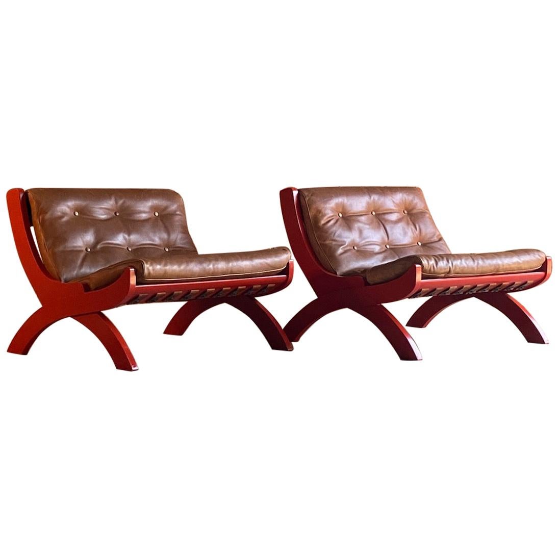 Marco Comolli CP1 lounge chairs by ICF, Italy, circa 1963

Fabulous pair of Marco Comolli Model CP1 Coppia di Poltrone lounge chairs by ICF De Padova Italy circa 1963, finished in tangerine colored walnut frames with brown tufted camel leather