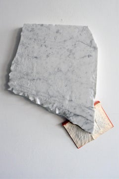 In esergo III, minimalist  wall sculpture with book and marble by Marco Cordero