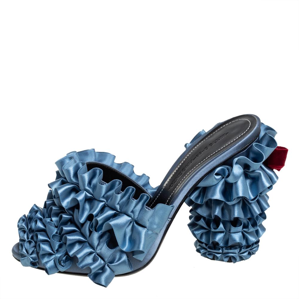 Marco de Vincenzo understands your need for comfort and style in these sandals. These sandals crafted from satin & velvet and feature intriguing ruffle details all over the peep-toe vamps and high block heels. These stylish blue sandals are lined