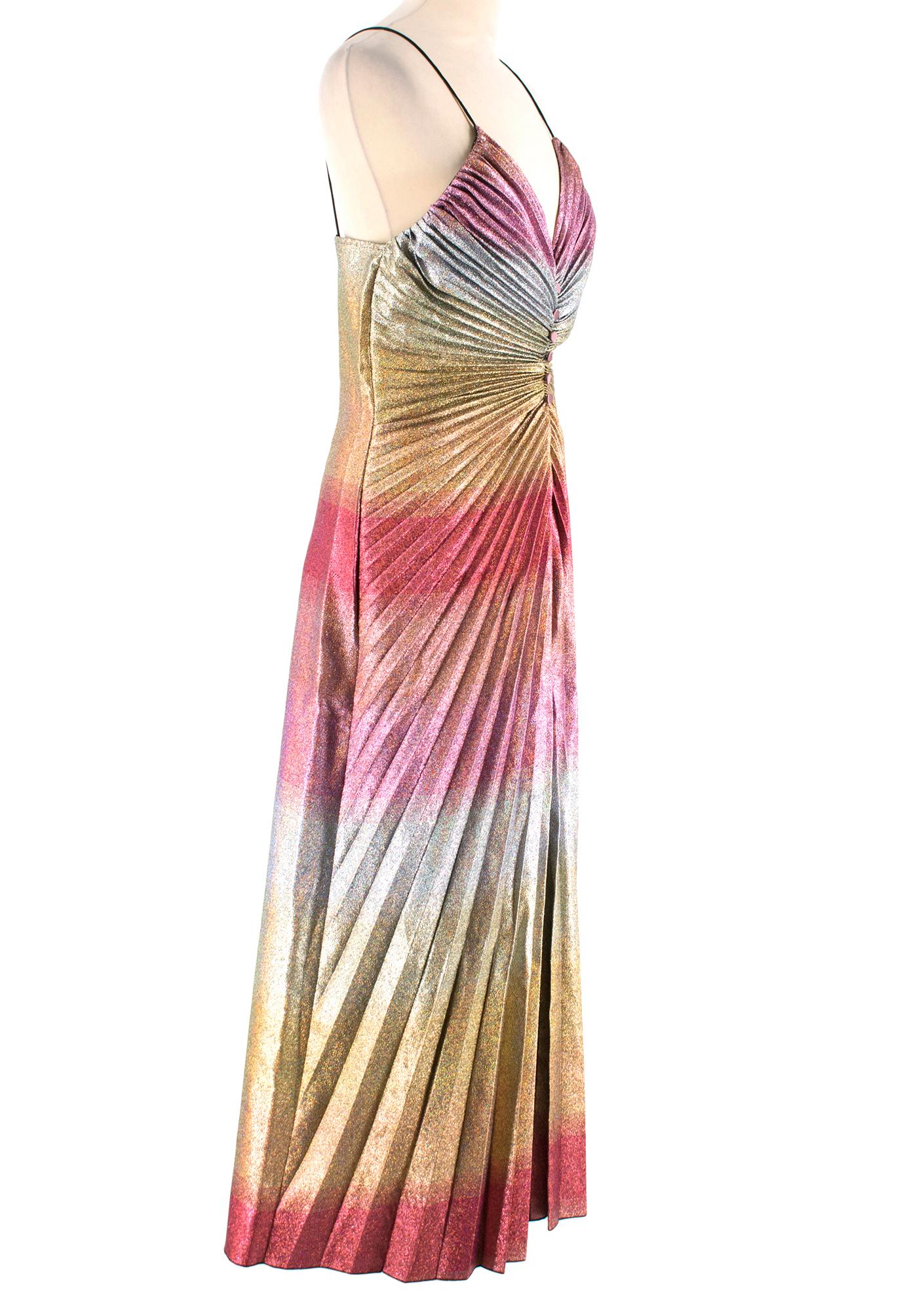 Marco de Vincenzo Front Slit Metallic Midi Dress

- Pleated detail throughout 
- Front Button Detail 
- Thin shoulder straps 
- Back invisible zip fastening 
- Front Slit 

Materials 
- 67% Polyester
- 33% Polyamide 

Dry Clean Only 

Please note,