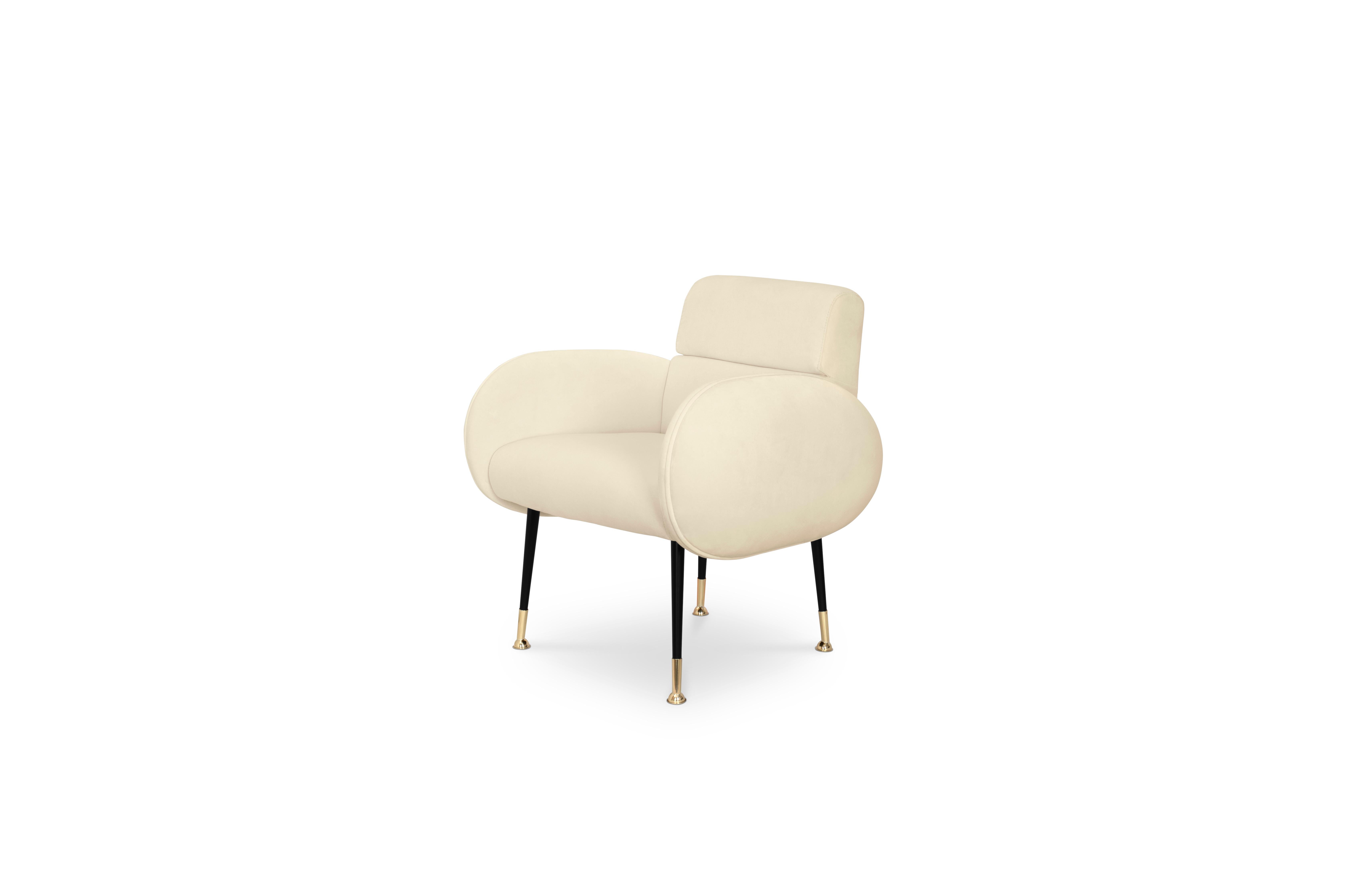 A dining chair part of the Marco collection, this mid-century piece is the ultimate chair for a luxurious dining room ready for a feast. Marco dining chair features polished brass and glossy black feet along with round shaped arms that provide even